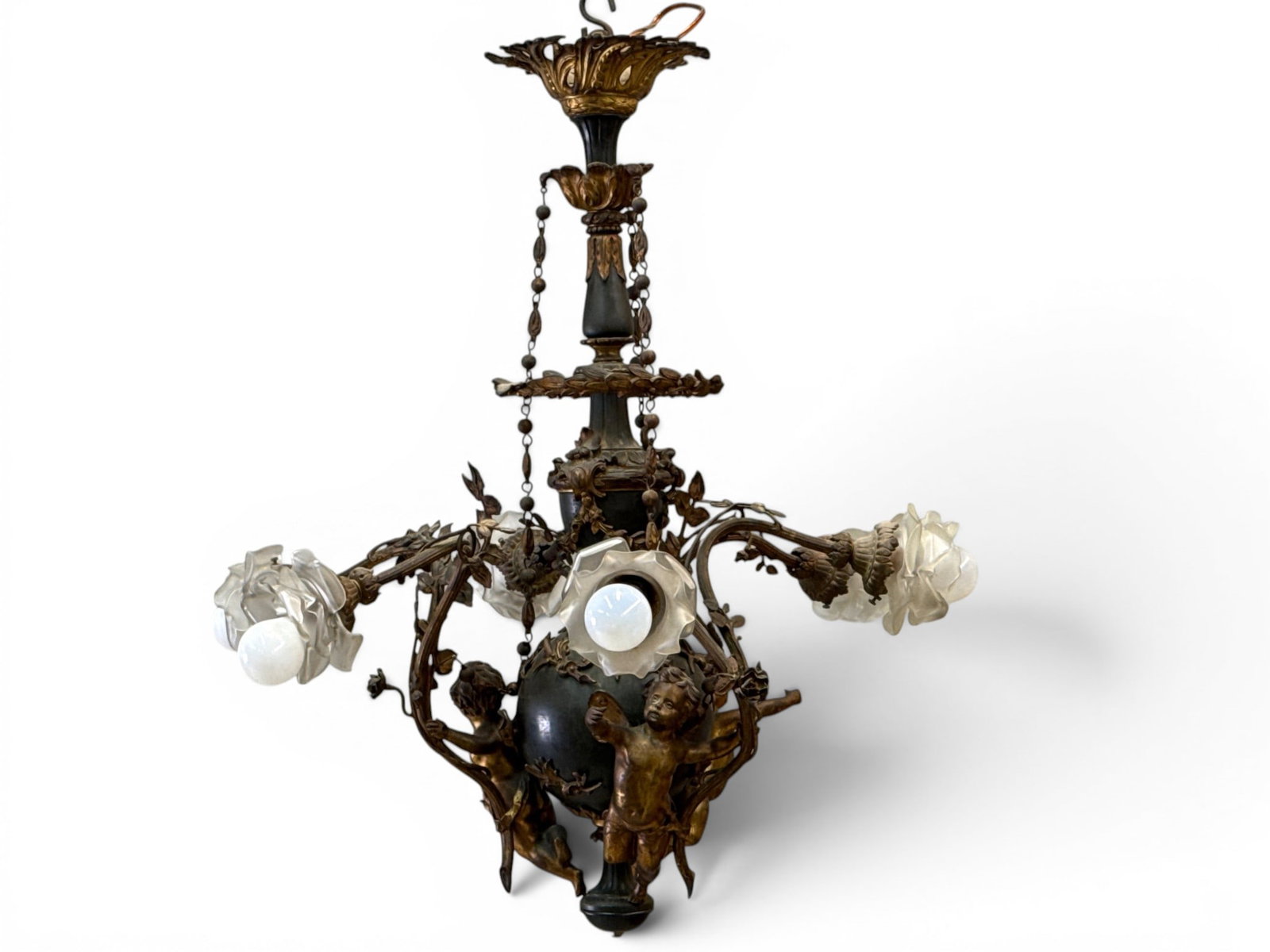 French Belle Epoque Cherub Chandelier: A French Belle Epoque six-light chandelier with patinated cherub forms and foliate designs. 31in tall x 27in wide. | You have additional shipping options, and are not required to use Live Shipping. Ad