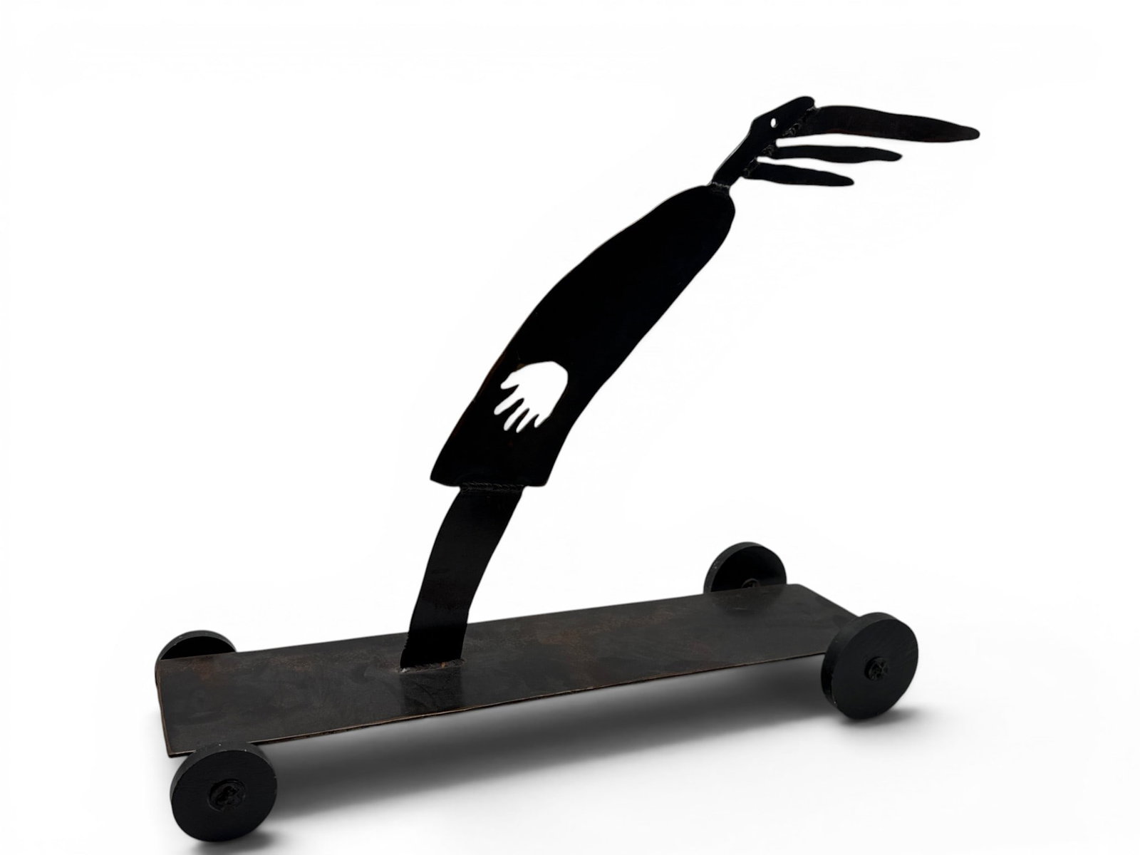 Lisa Feldon Steel Sculpture: Life: Lisa Feldon (Chester County, PA, Contemporary). A welded steel sculpture titled "Life" depicting a whimsical wind-blown figure on a steel cart with wooden wheels. Signed and dated 1999. 18in tall x 21