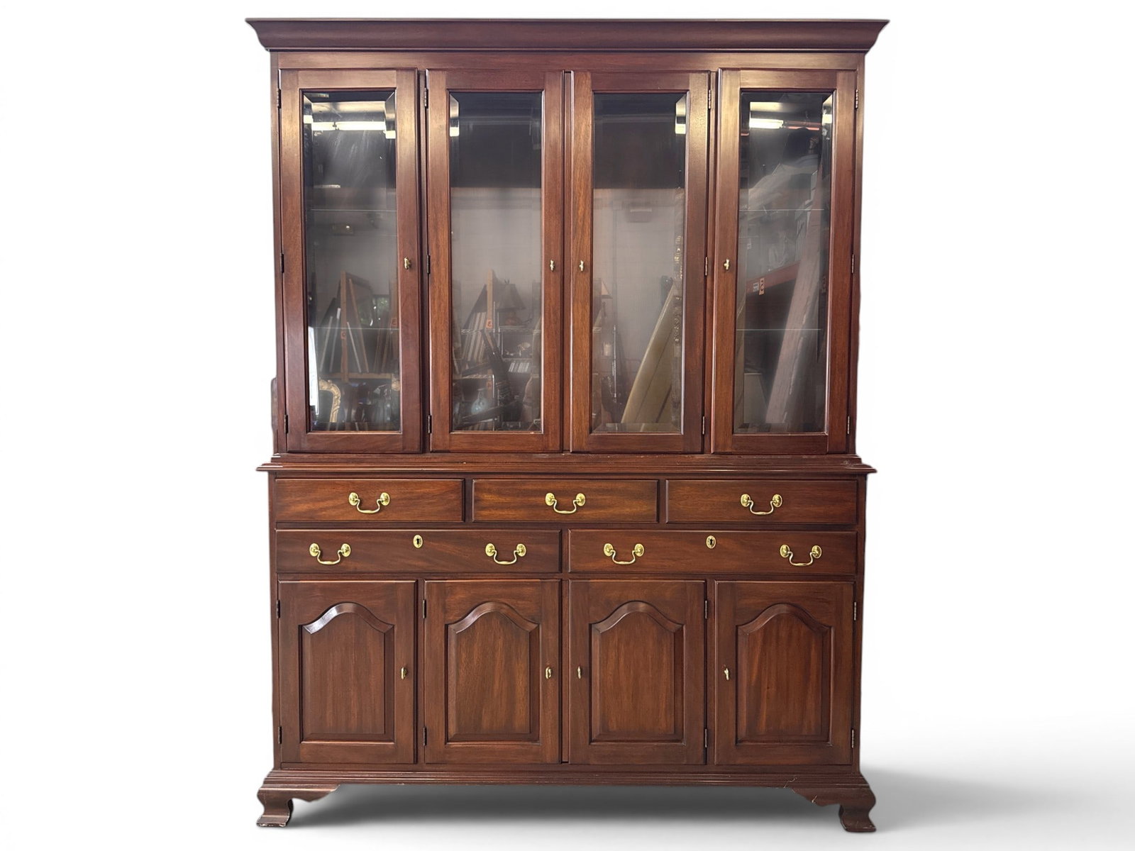 Henkel Harris Chippendale-style China Cabinet: A Henkel Harris Virginia Galleries Chippendale-style two-part breakfront or china cabinet. 78in tall x 60in wide x 17in deep. Upper case doors do not closer properly. | You have additional shipping