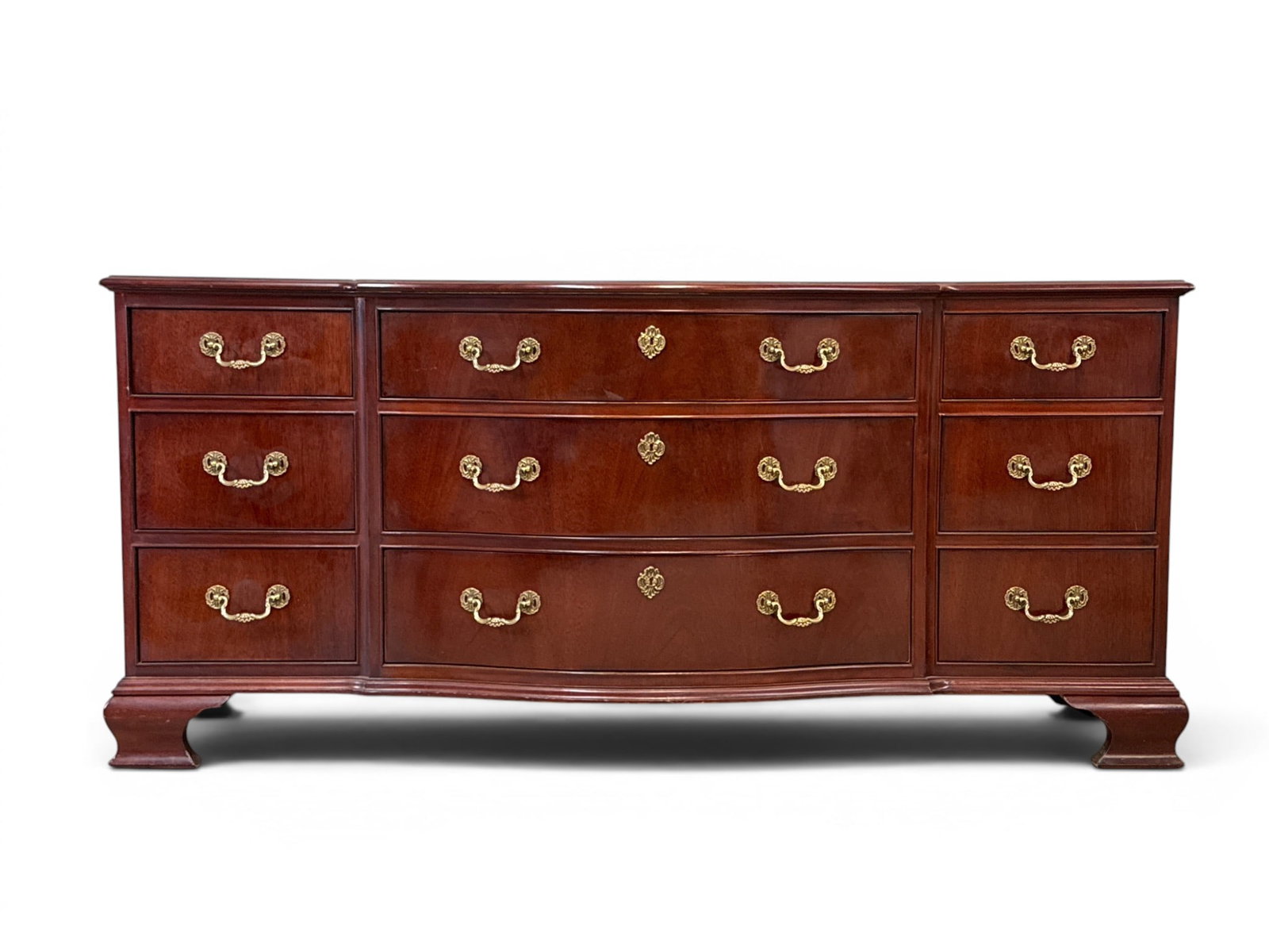 Baker Chippendale-style Mahogany Dresser: A Baker Furniture Chippendale-style mahogany bureau dresser. 32in tall x 70in wide x 21-1/4in deep. | You have additional shipping options, and are not required to use Live Shipping. Additional