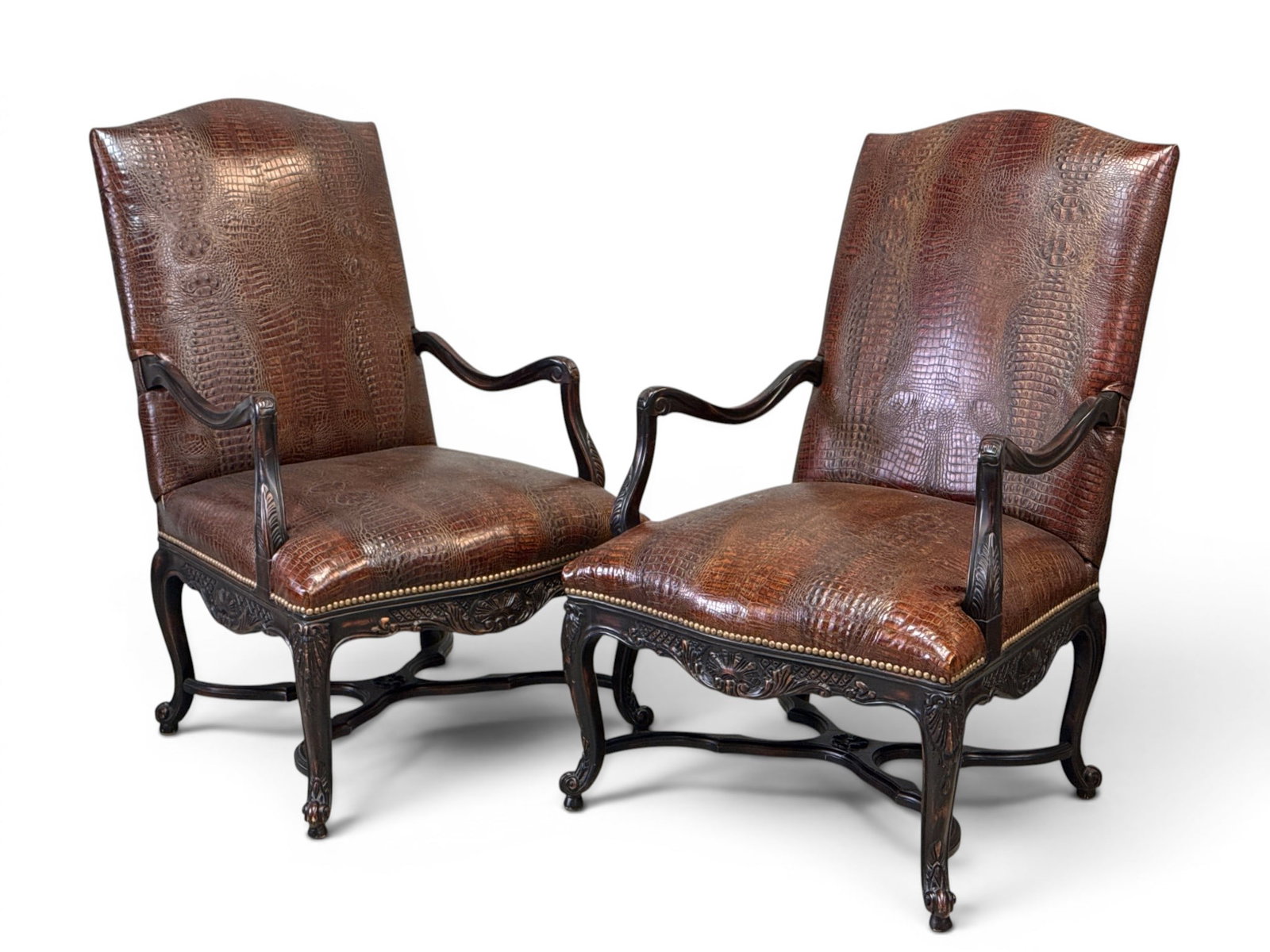 Pair of Leather Louis XV-style Arm Chairs: A decorator pair of carved Louis XV-style high-back arm chairs with alligator-style leather upholstery. 43in tall x 27in wide x 29in deep. | You have additional shipping options, and are not required