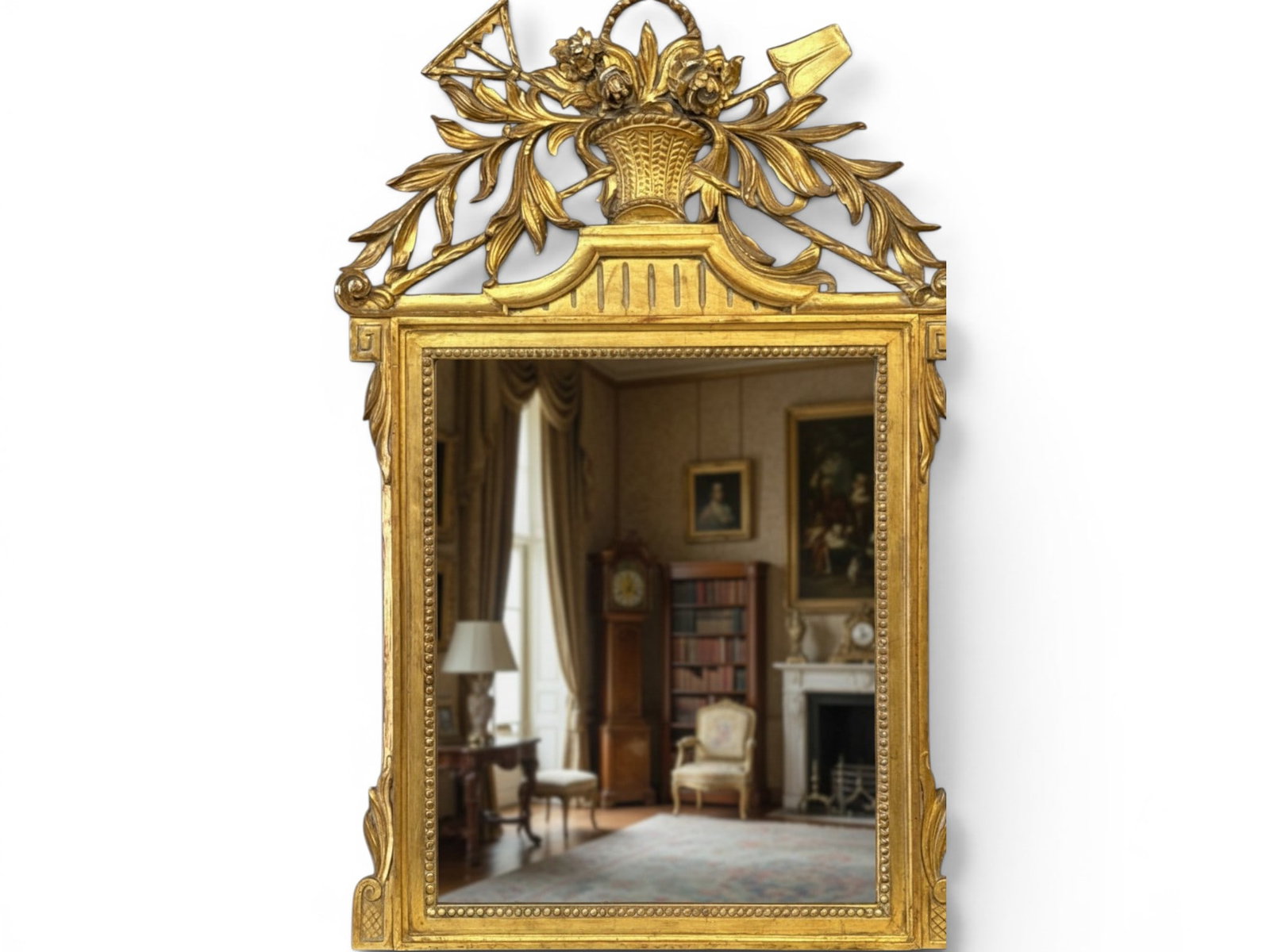French Louis XVI-style Giltwood Wall Mirror: A French Louis XVI-style giltwood wall mirror having a harvest themed crest with rake and shovel. 45in tall x 30in wide. | You have additional shipping options, and are not required to use Live Shippi