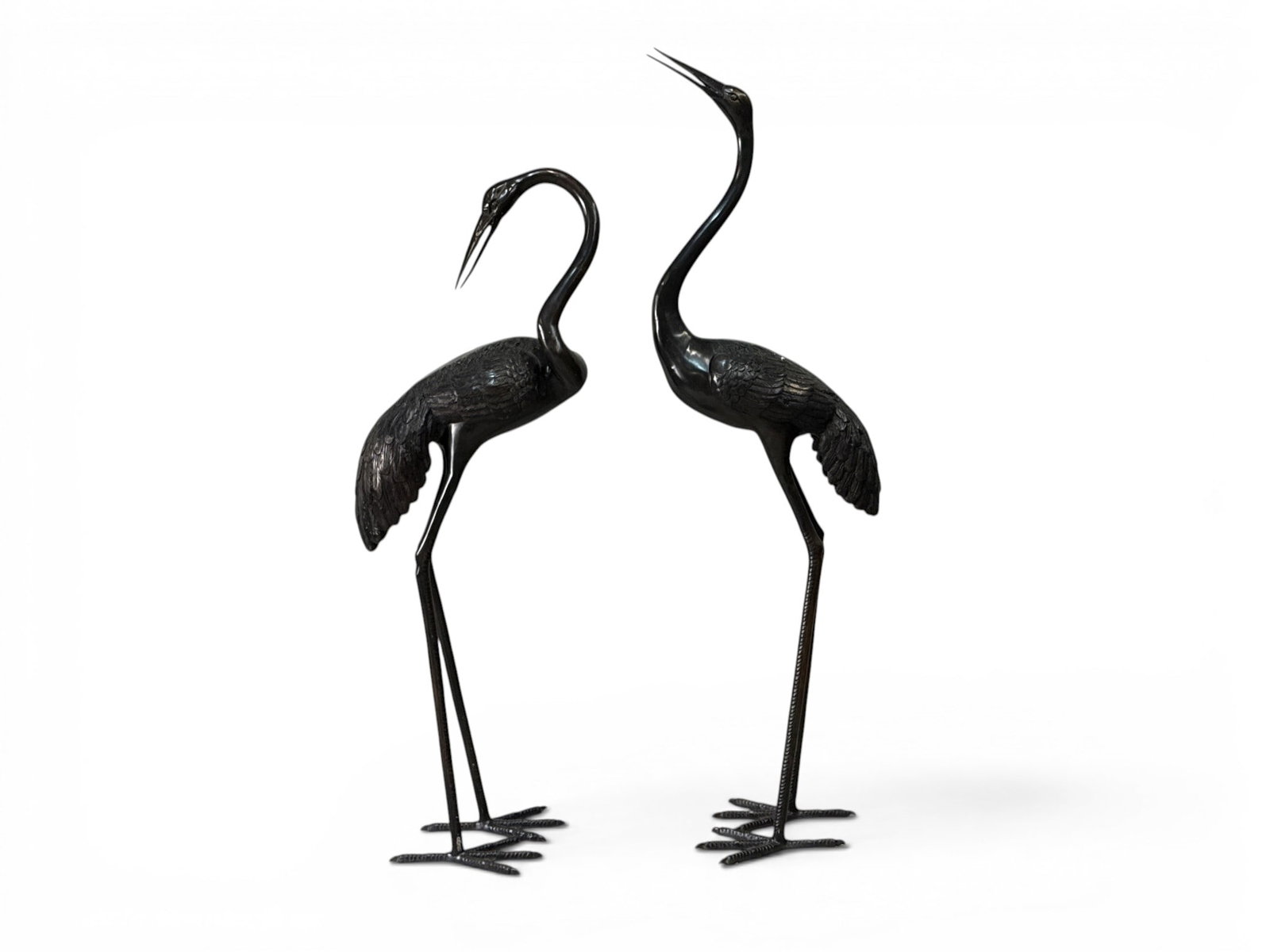 Pair of Monumental Bronze Garden Crane Statues: A pair of monumental bronze garden crane statues. Taller: 68-1/2in tall x 21in wide. | You have additional shipping options, and are not required to use Live Shipping. Additional shipping and