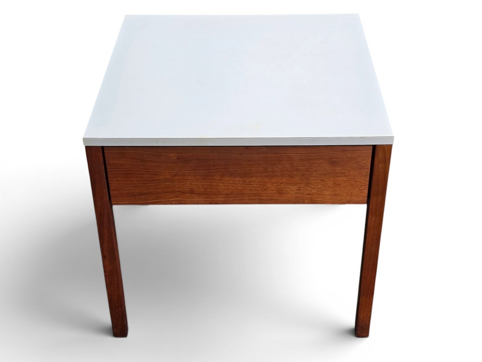 Florence Knoll Walnut and Laminate Side Table: A Florence Knoll white laminate top walnut side table with a single drawer. | You have additional shipping options, and are not required to use Live Shipping. Additional shipping and delivery details 