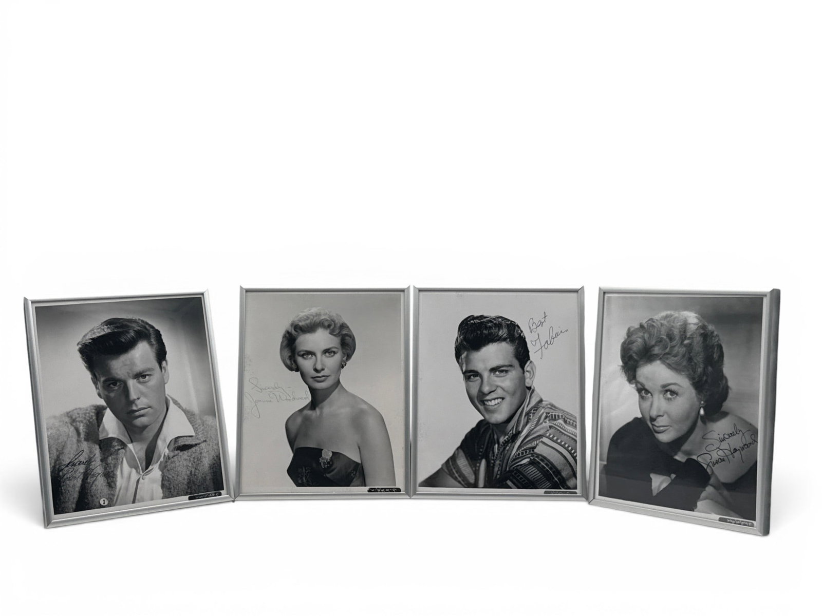 Four Old Hollywood Signed Photographs: Four black and white old Hollywood signed photographs to include Robert Wagner, Joanne Woodward, Fabian, and Susan Hayward. Matching frames. Each: 10-1/2in tall x 8-1/2in wide. | You have additional