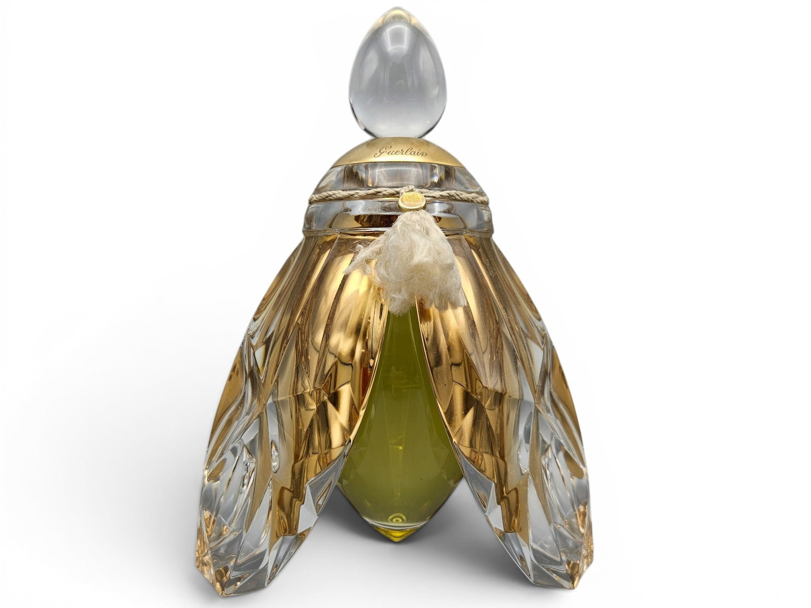 Lorenz Baumer L'Abeille de Guerlain Baccarat Gold Wing Perfume: A bottle of Guerlain, Paris, L'Abeille de Guerlain ("The Bee of Guerlain) with bottle designed by Lorenz Baumer and produced by Baccarat, featuring gold-accented wings. Only 47 bottles were made. 9in 
