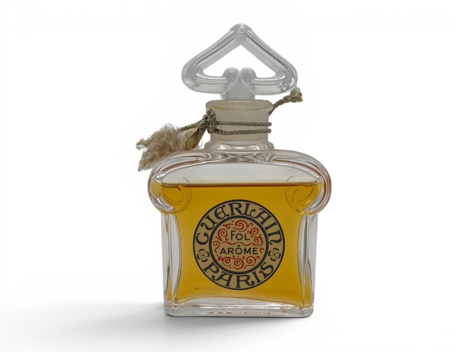 Guerlain Fol Arome Perfume: A bottle of Guerlain Fol Arome perfume. 3-5/8in tall. | You have additional shipping options, and are not required to use Live Shipping. Additional shipping and delivery details are available on our w