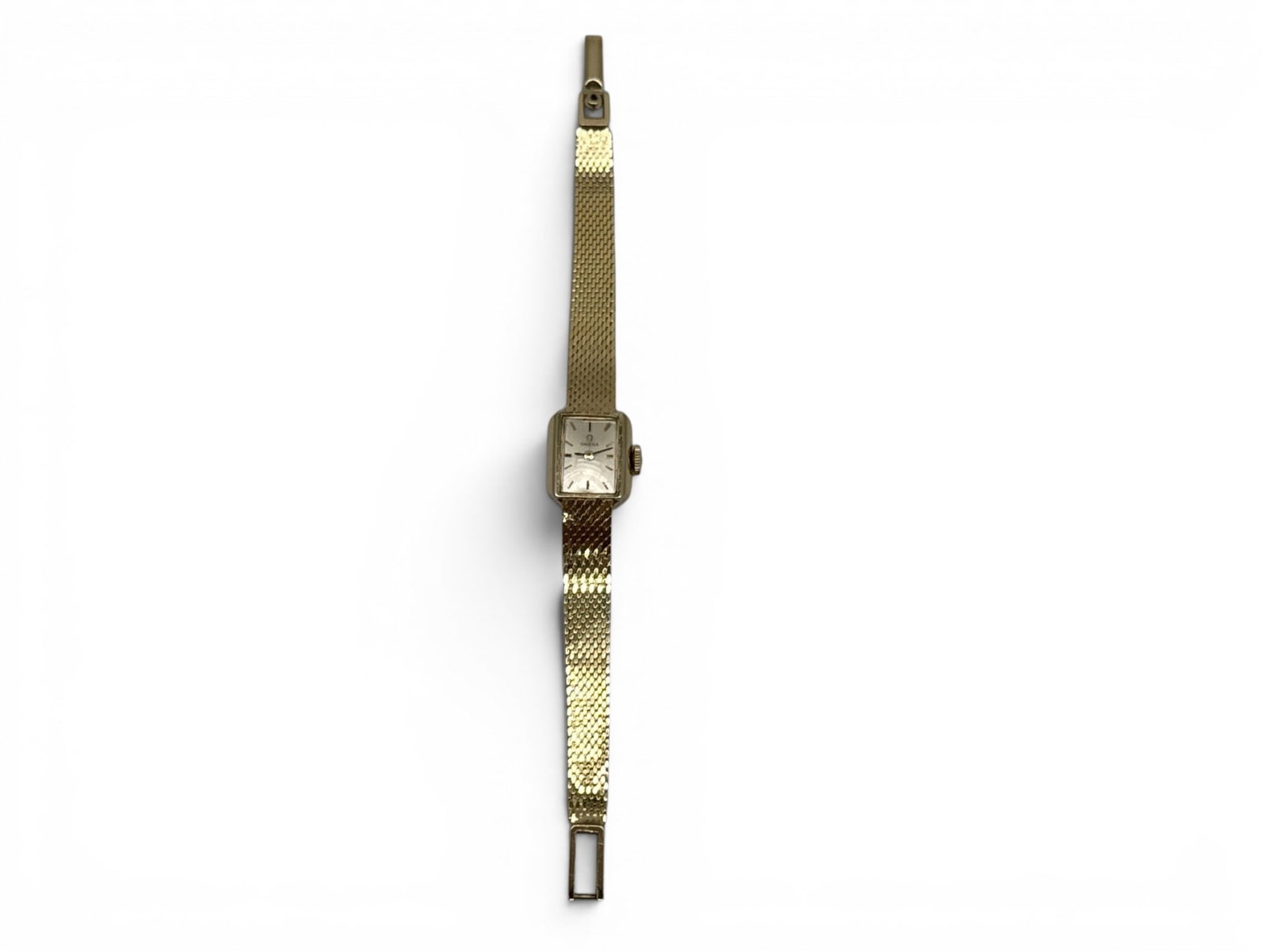Omega 14K Ladies Wristwatch: An Omega 14K yellow gold ladies watch with gold rectangular case and woven mesh bracelet. Marked 14K. 5-5/8in long. 11.18 dwt. | You have additional shipping options, and are not required to use Live 