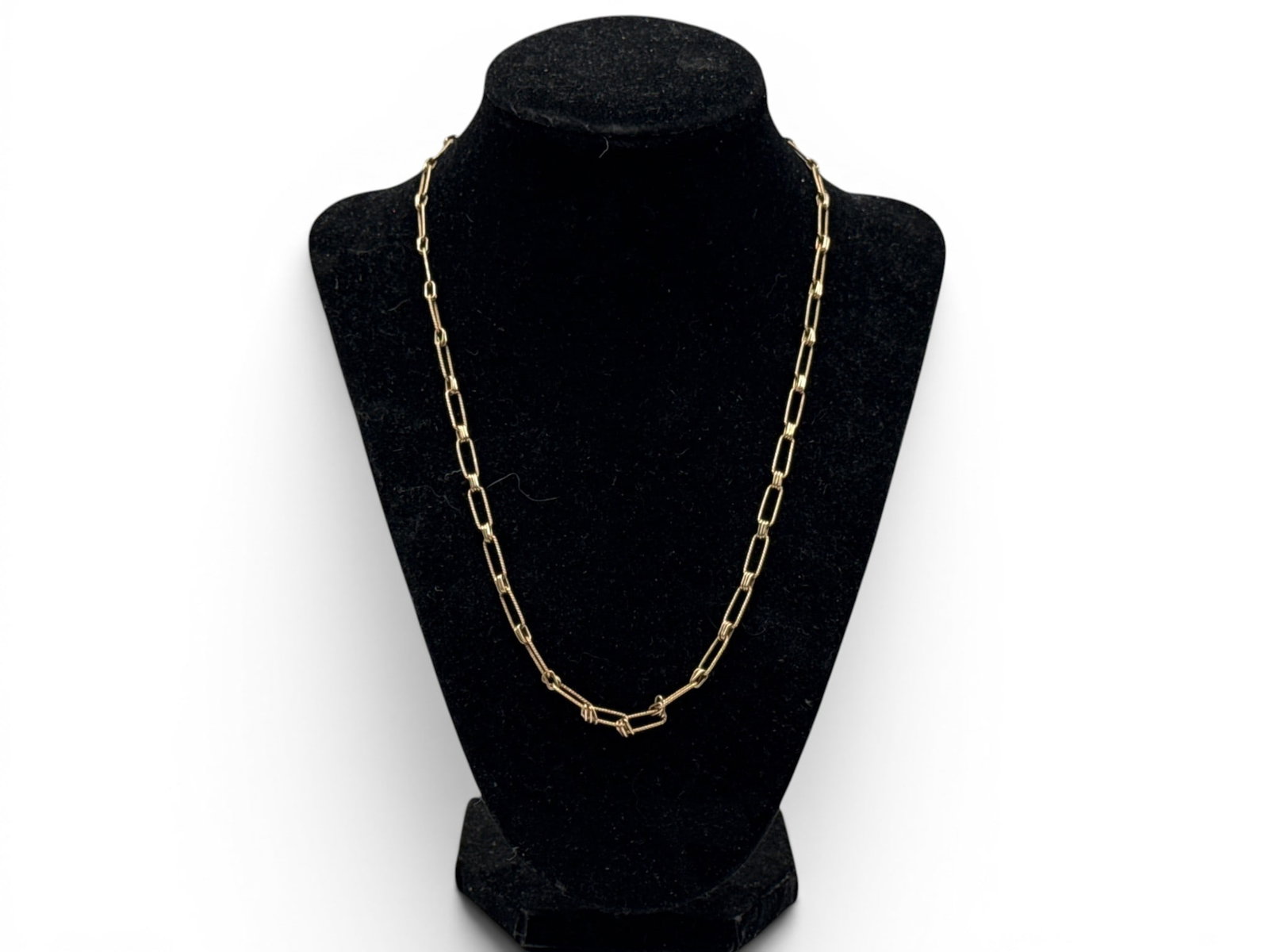 10K Modernist Twisted Chain Necklace: A 10K yellow gold necklace with custom oval-shaped spiral twist open links. Marked on clasp. Includes Independent Gemological Services appraisal. Necklace: 20in long. 6.88 dwt. | You have additional