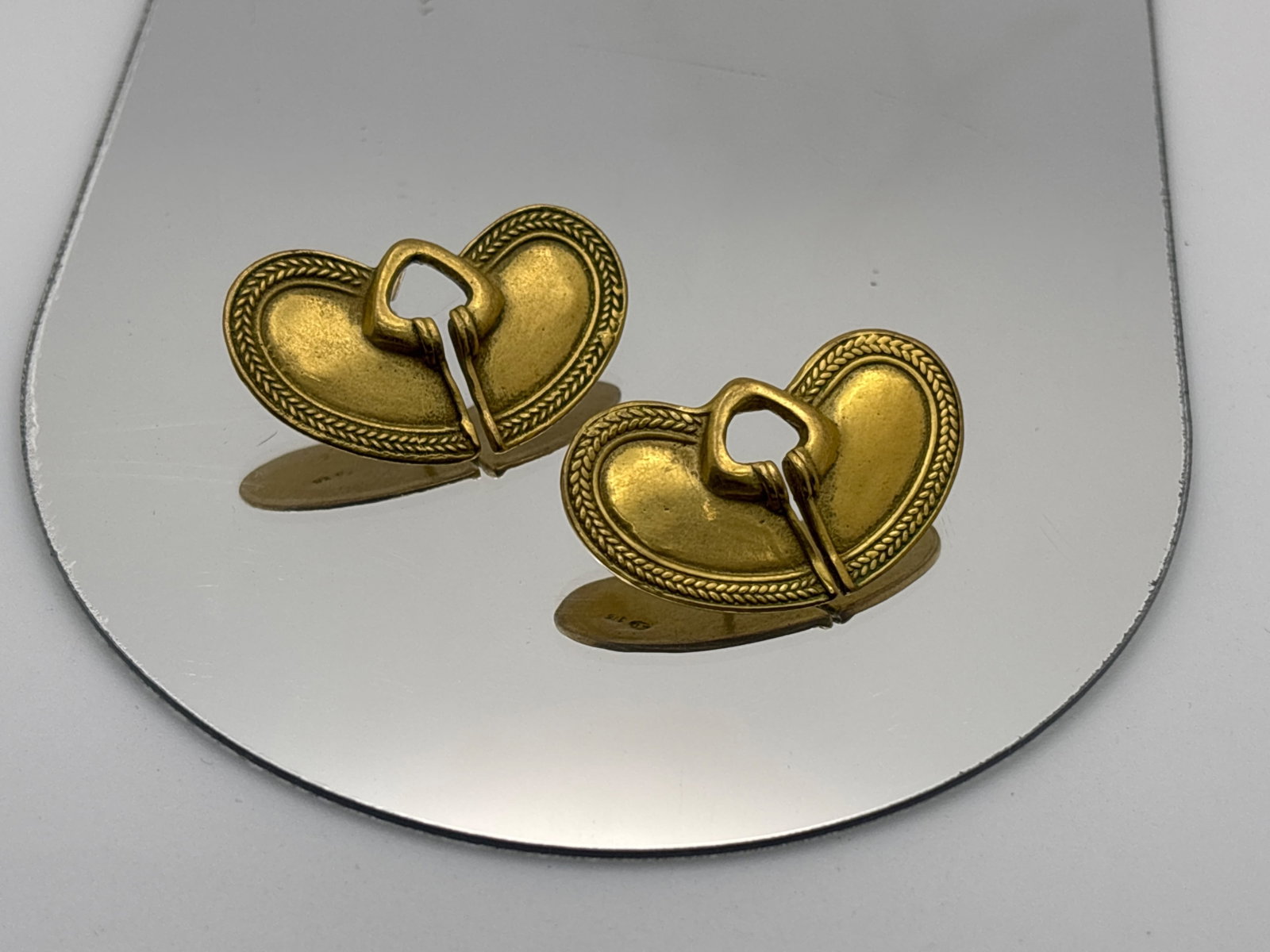 24K Pre-Colombian-style Butterfly Talisman Earrings: A pair of 24K yellow gold Tairona butterfly talisman-style earrings with shaped and textured design. Stamped GP JH 24K on back. 7.8in tall x 1-3/8in wide. 5.96 dwt. | You have additional shipping opti