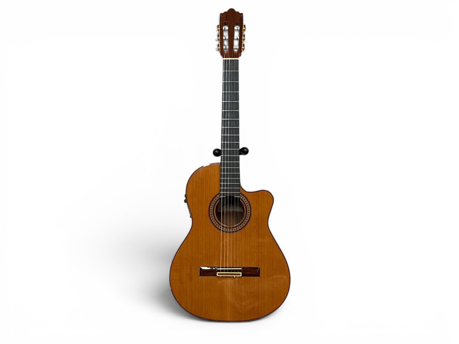 Jose Ramirez 2CWE Electric Cutaway Guitar: A Jose Ramirez 2CWE Electric Cutaway, circa 2003, with spruce, ebony, and rosewood body. HumiCase Metro hard case. | You have additional shipping options, and are not required to use Live Shipping. Ad