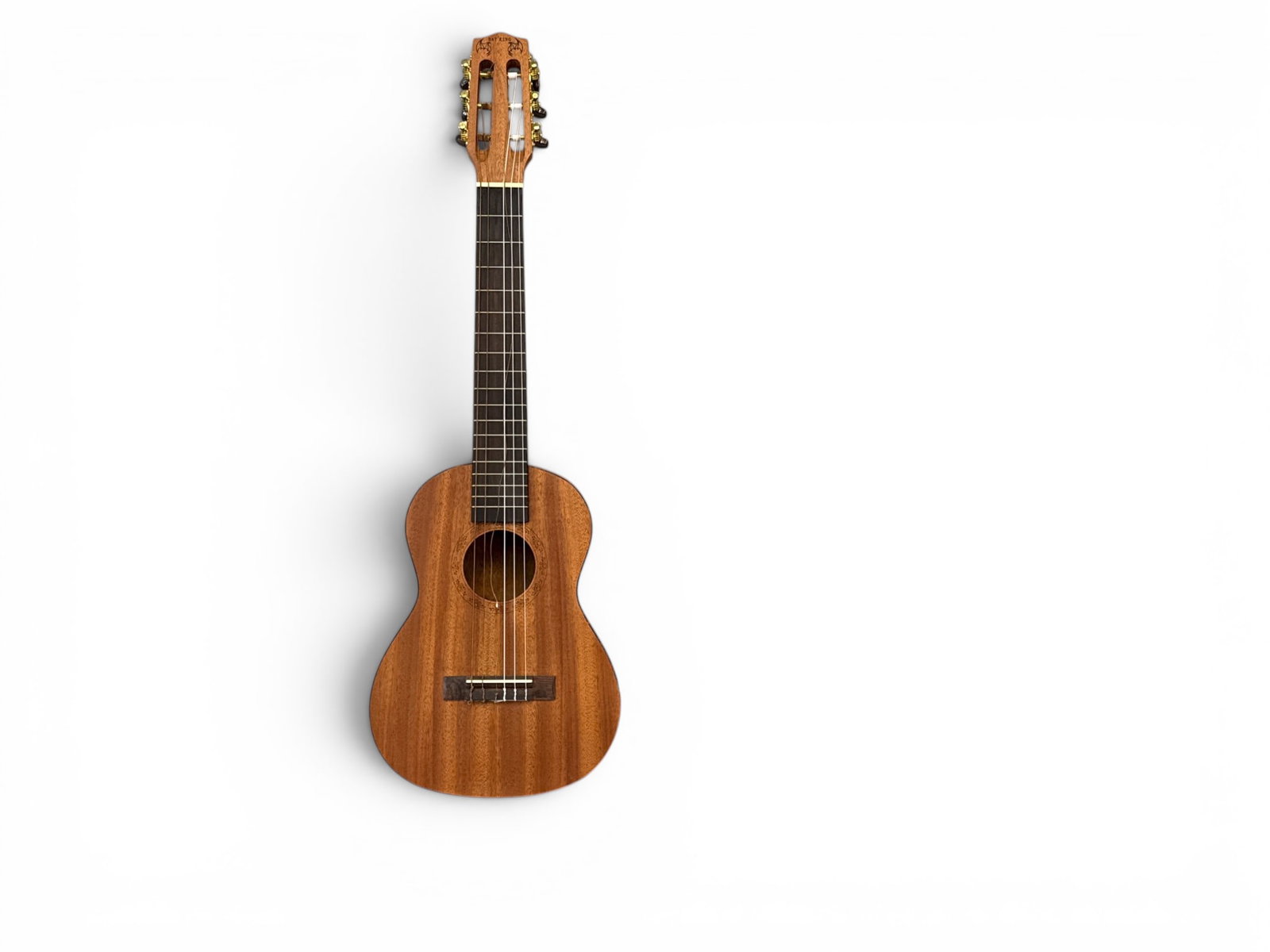 Bat King Ukelele Guitar: A Bat King mahogany ukelele guitar. With soft case. | You have additional shipping options, and are not required to use Live Shipping. Additional shipping and delivery details are available on our web