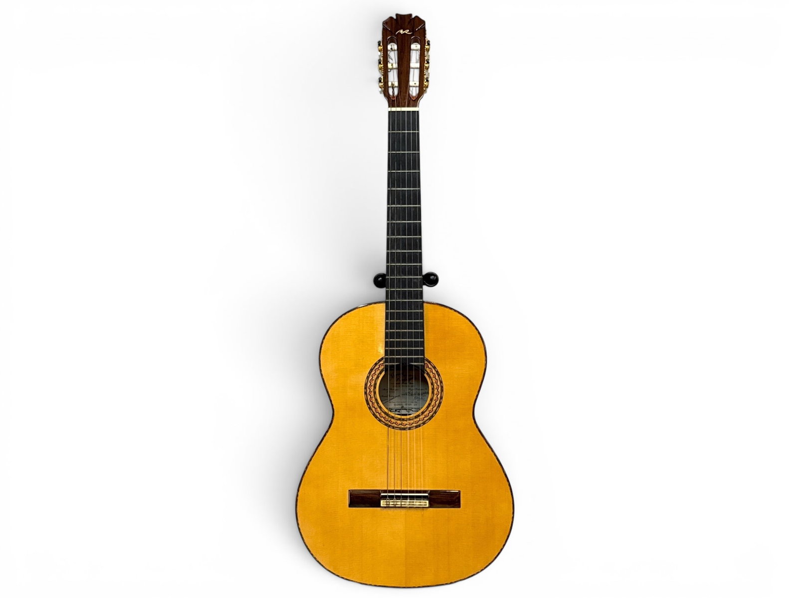 Manuel Rodriguez and Sons Centenario Guitar 69/100: A Manuel Rodriguez and Sons Centenario guitar, circa 2005. Brazilian rosewood, spruce, and ebony. Numbered 69/100. Jimmy Carter has number 68. With hard case. | You have additional shipping options, a