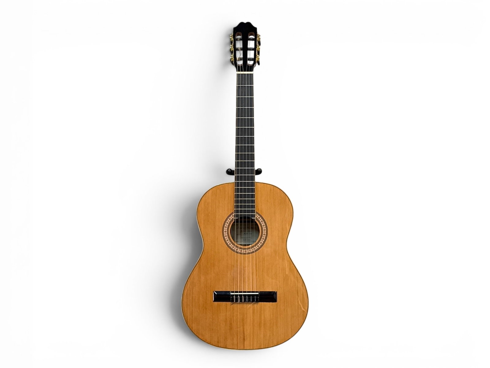Antonio Hermosa AH-12 Acoustic Guitar: An Antonio Hermosa AH-12 acoustic guitar with case. | You have additional shipping options, and are not required to use Live Shipping. Additional shipping and delivery details are available on our web