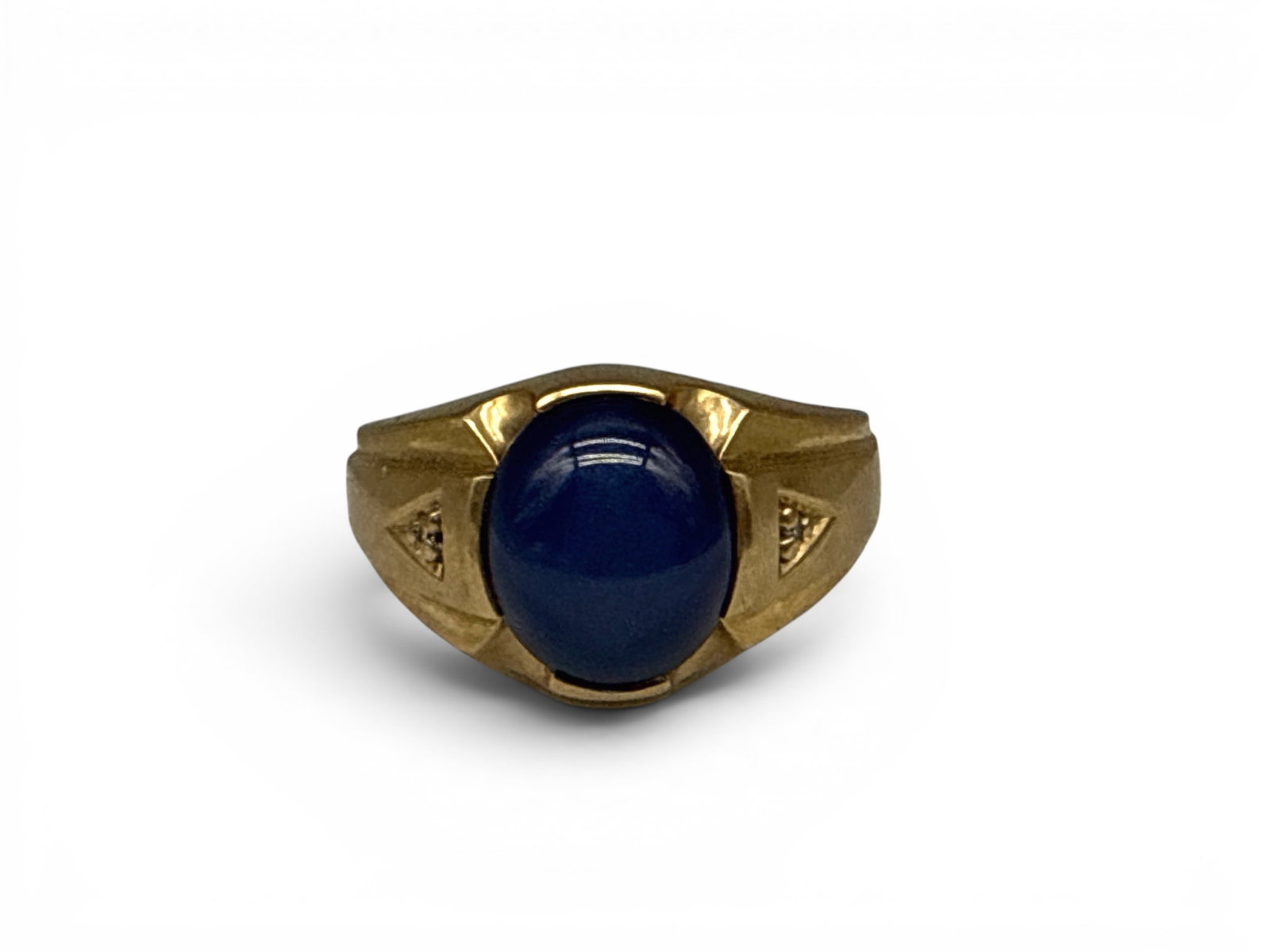 10K Yellow Gold Glenn Roberts Signet Ring: A Glenn Roberts 10K yellow gold signet ring with oval cut star sapphire flanked by two small diamonds. Marked "GLR" "10K" on interior. Size 10-3/4. 13.31 dwt. | You have additional shipping options, a