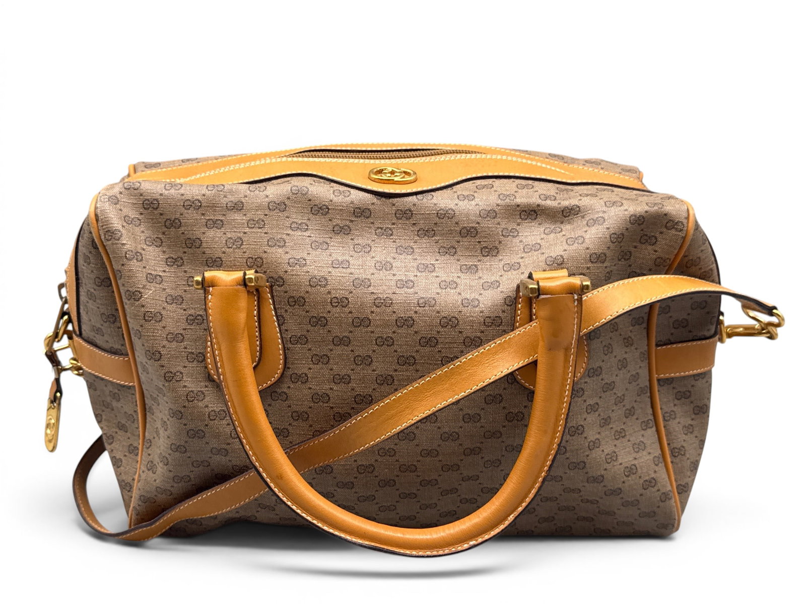 Gucci Monogram Micro GG Boston Bag: A Gucci monogram micro GG Boston bag with gold-tone hardware and leather shoulder strap. Marked Gucci with serial number 002-58-4422. 7in tall x 13in wide. | You have additional shipping options, and 