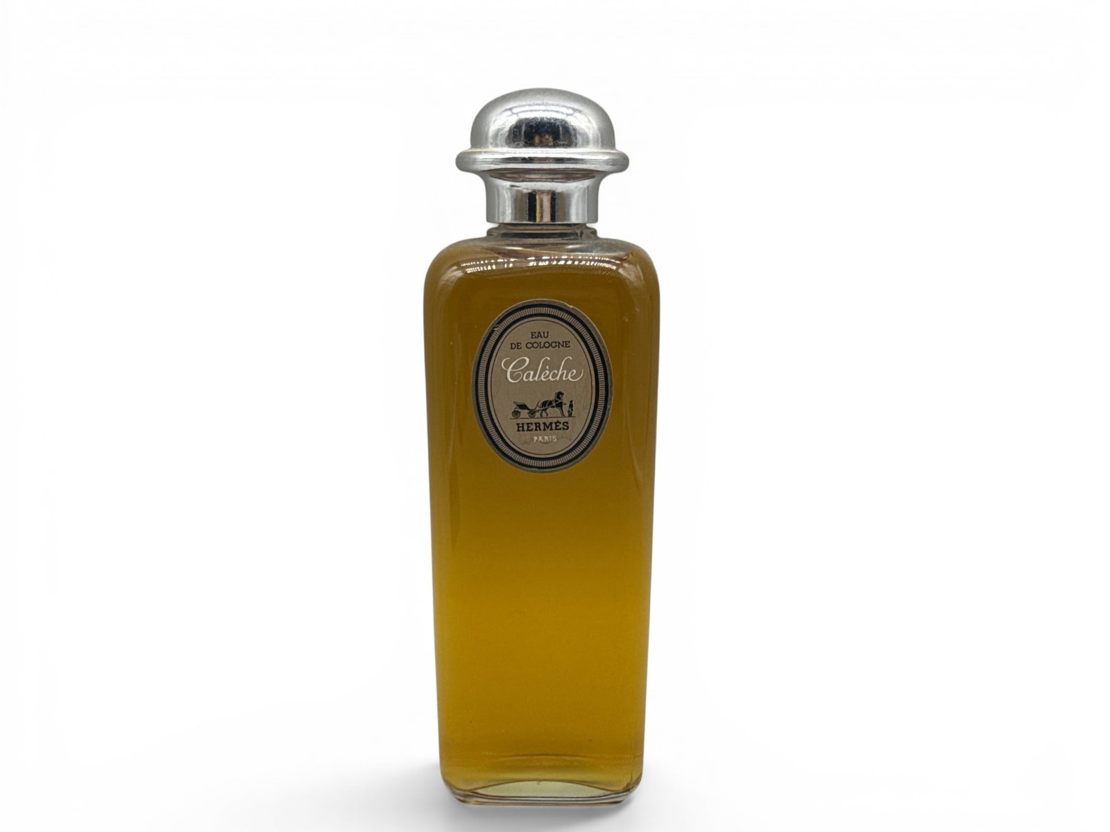 Hermes Caleche Eau De Cologne: A 16-ounce bottle of Hermes Caleche Eau de Cologne in original glass bottle with Art Deco-style chrome stopper. 8-1/2in tall x 2-1/2in wide. | You have additional shipping options, and are not require