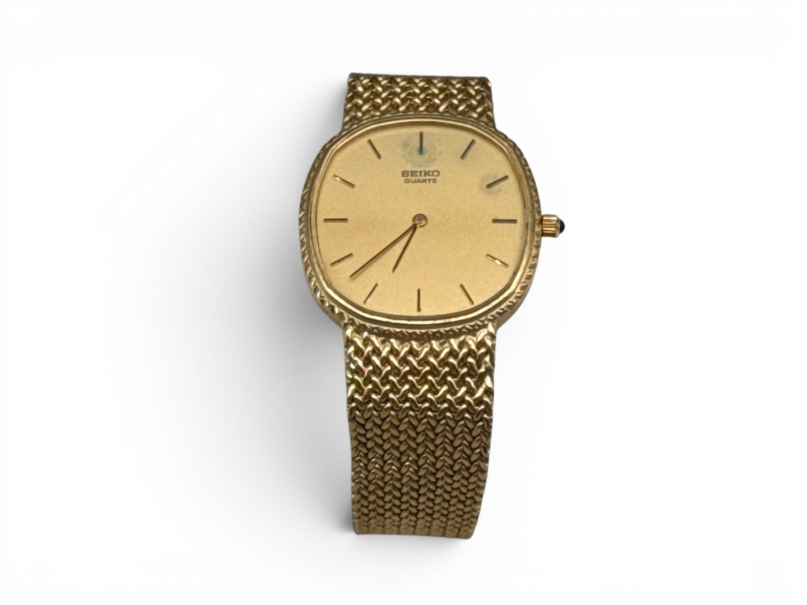 Seiko 14K Yellow Gold Women's Quartz Watch: A Seiko women's quartz watch with 14K yellow gold cushion-shaped case and 14K gold mesh band. Numbered 6020-4590-A. Wristwatch: 8in long. 36.26 dwt. | You have additional shipping options, and are not