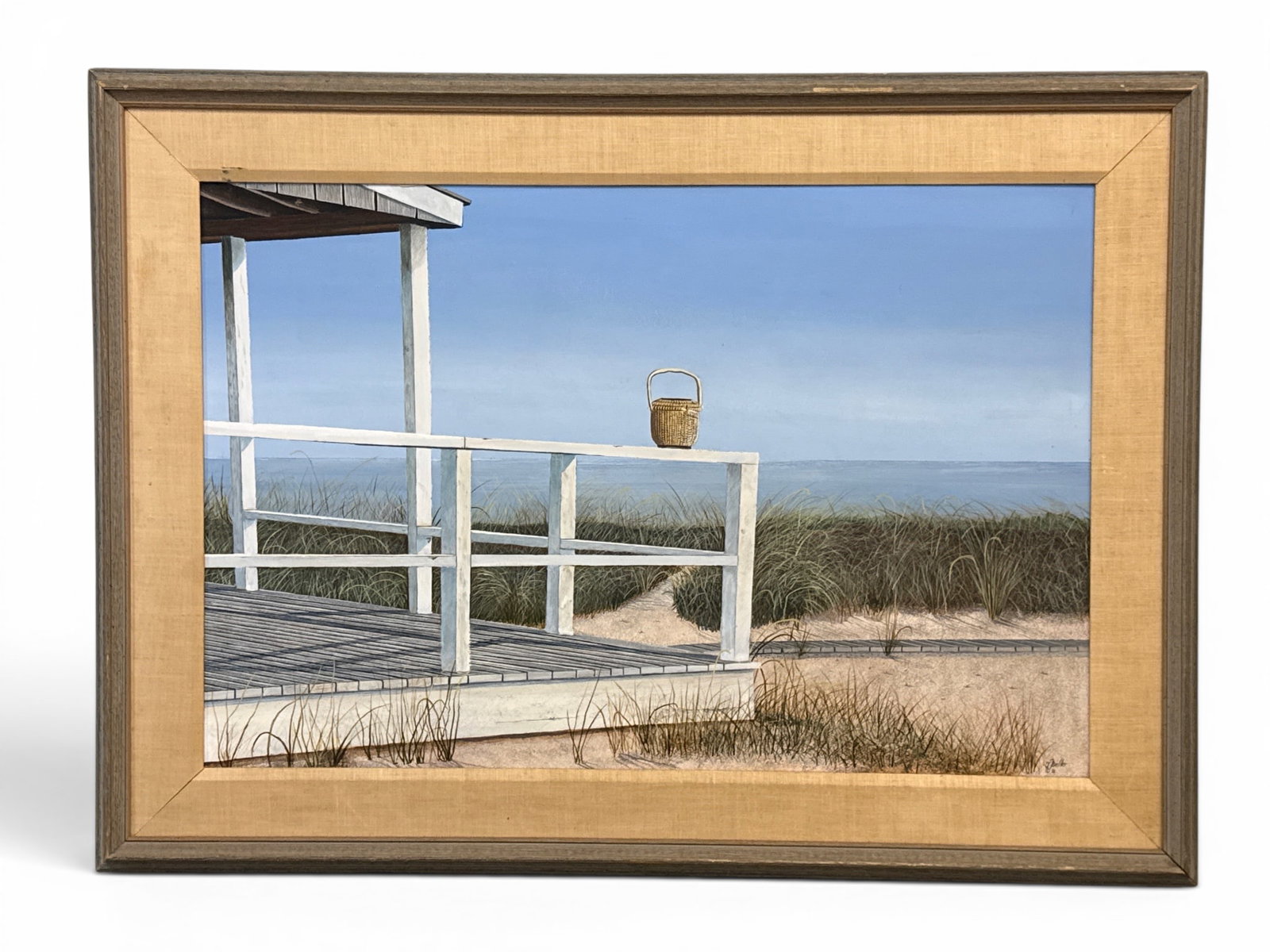 Tom Mielko Tempera/Masonite: Nantucket: Tom Mielko (American, 20th C.). A large-format tempera on masonite of a woven Nantucket basket resting on the edge of a beach house in a dune landscape. Signed lower right. Frame: 33in x 44in. | You h