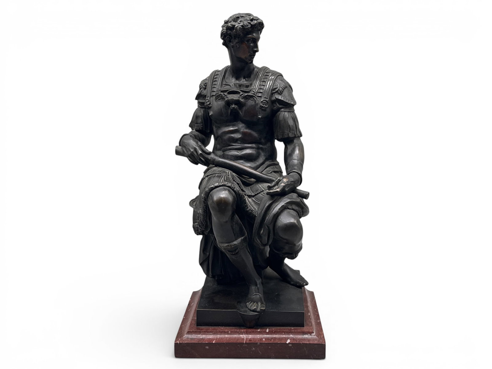 After Michelangelo Bronze: Giuliano De Medici: A Grand Tour bronze sculpture after Michaelangelo depicting a seated Giuliano de Medici in full warrior clothing, on a rouge marble plinth. 18in tall x 7-1/2in wide. | You have additional shipping opt