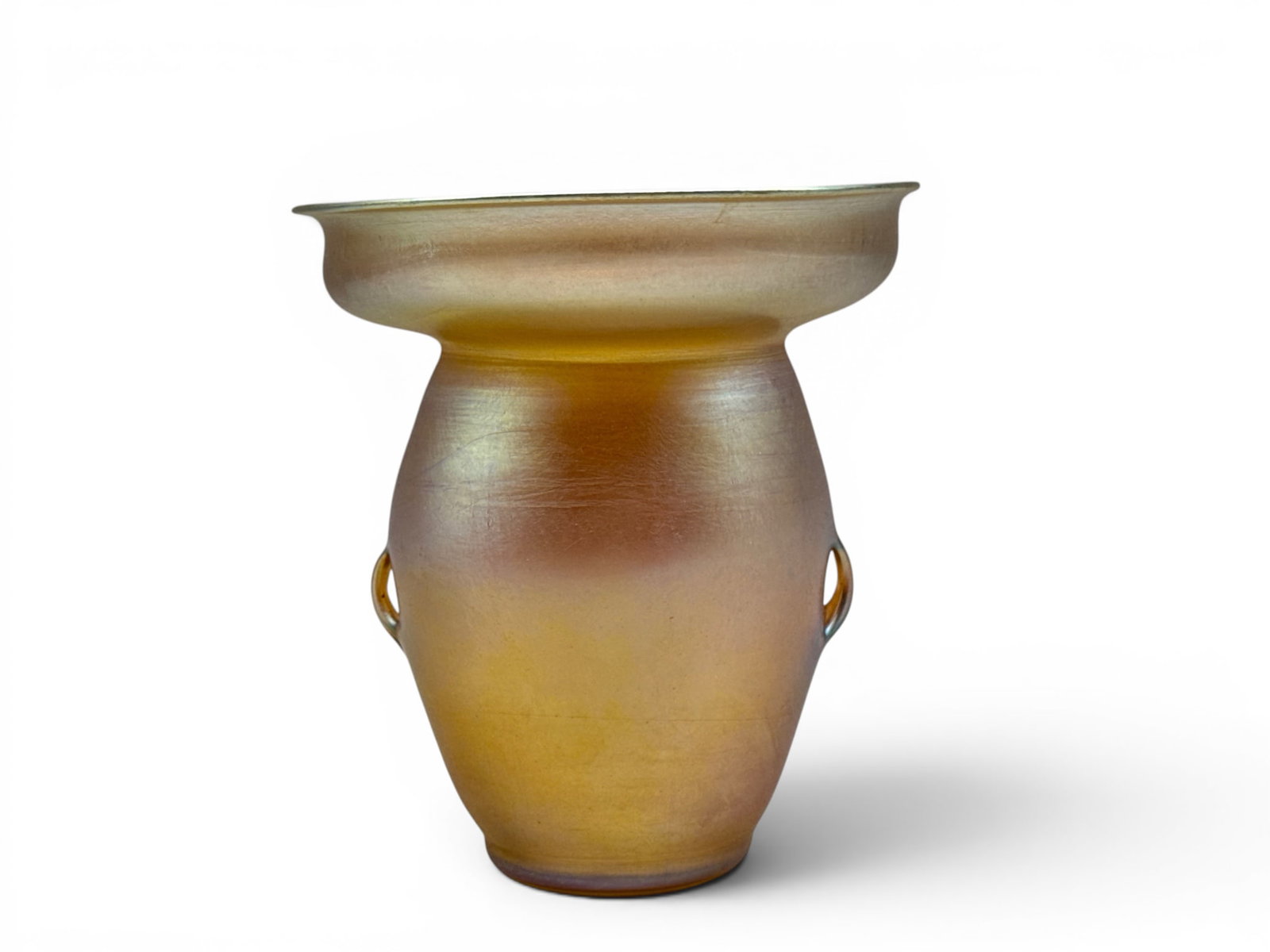 Louis Comfort Tiffany Favrile Cabinet Vase: A Louis Comfort Tiffany favrile iridescent cabinet vase with diminutive handles. Signed. Numbered 779B. 5in tall x 5in wide. | You have additional shipping options, and are not required to use Live Sh