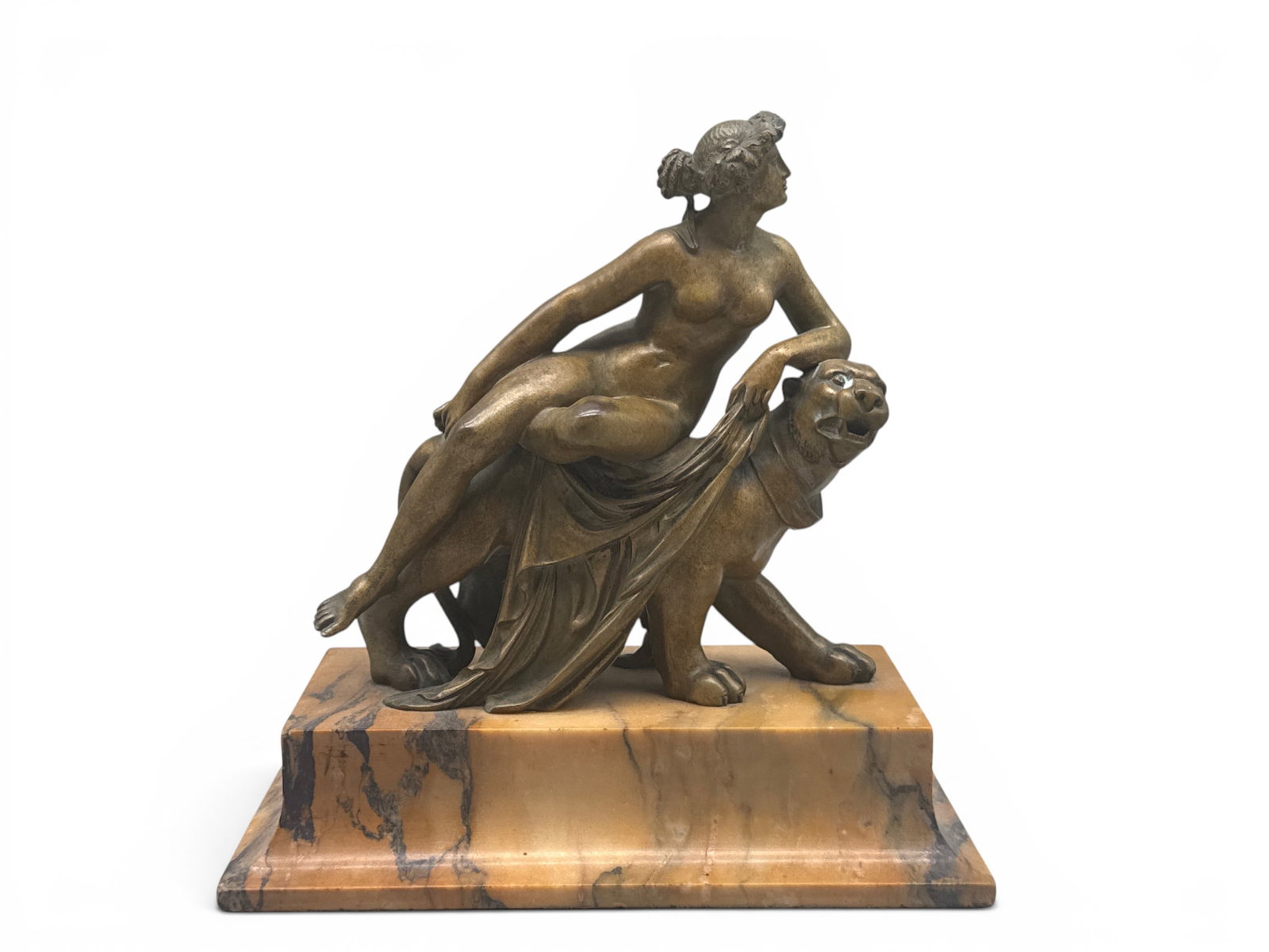 After Heinrich Bronze: Ariadne on the Panther: An after Johann Heinrich bronze sculpture of Ariadne on the Panther, on a pink marble base. 9in tall x 8-1/2in wide. | You have additional shipping options, and are not required to use Live Shipping. 