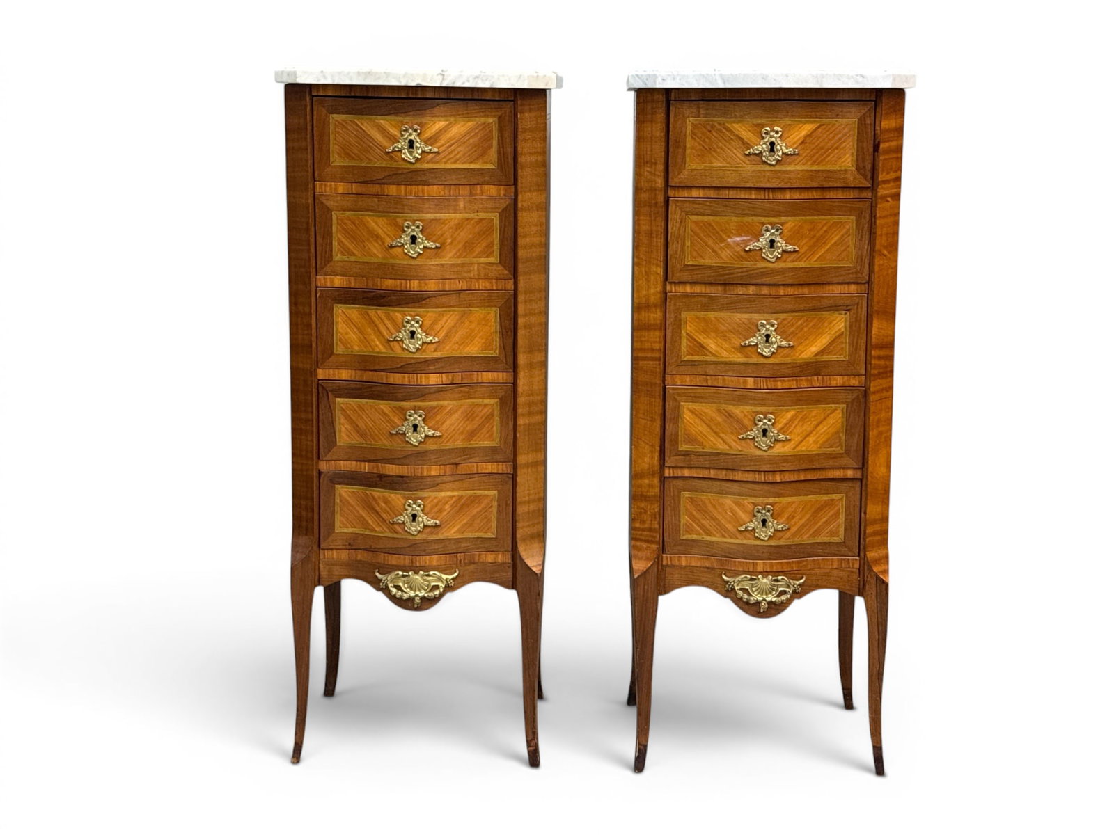 Pair of French Louis XV-style Parquetry Stands: A pair of French Louis XV-style parquetry stands with shaped marble tops over five-drawer cases with ormolu mounts, raised on cabriole legs. 39in tall x 15in wide x 14in deep. | You have additional sh
