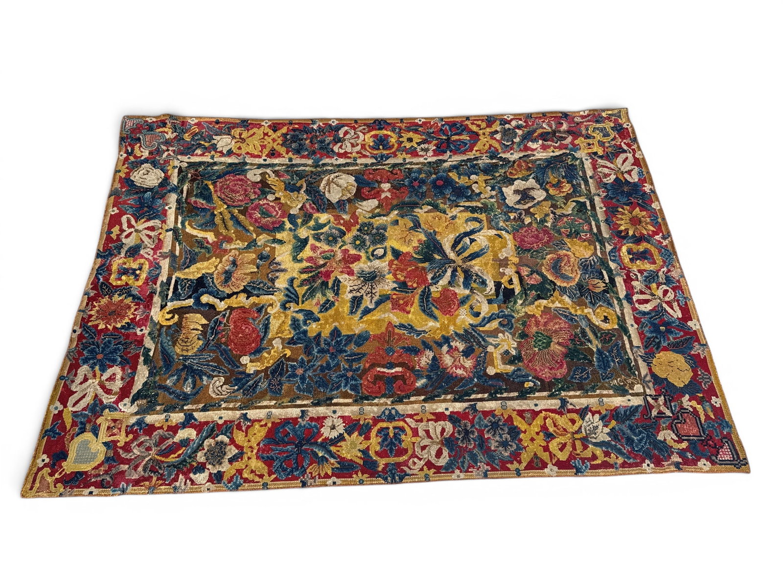 19th C. Portuguese Needlework Carpet, 11ft8 in x 8ft 4in: A 19th C. Portuguese needlework carpet in bright colors, with a floral design of poppies, peonies, and sunflowers. 11ft8 in x 8ft 4in. | You have additional shipping options, and are not required to u