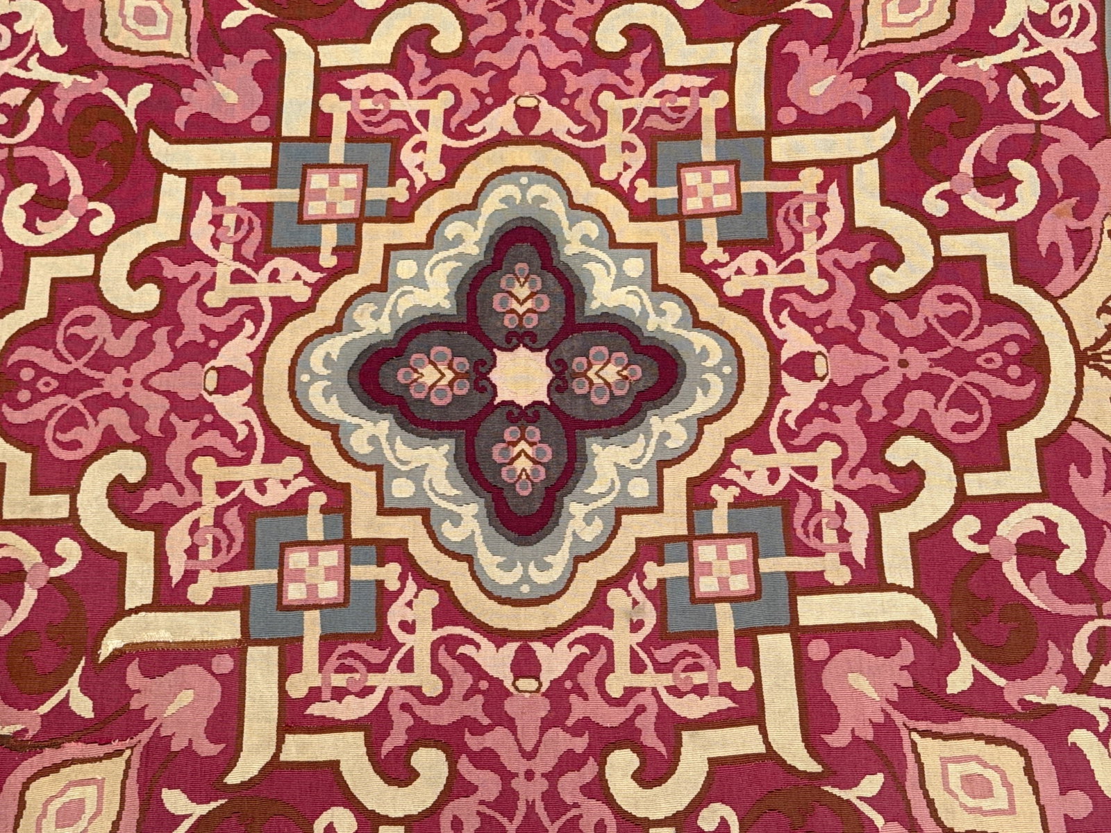 Louis Philippe Aubusson Carpet, 5ft 9in x 5ft 8in: A French 19th C. Louis Philippe Aubuson carpet with a central quatrefoil medallion. 5ft 9in x 5ft 8in. | You have additional shipping options, and are not required to use Live Shipping. Additional