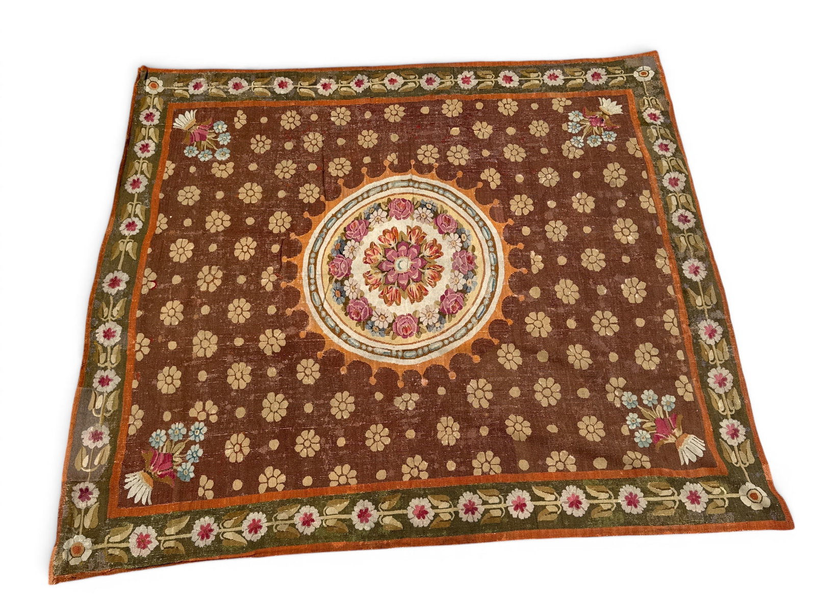 Charles X Aubusson Carpet, 9ft 8in x 8ft 3in: A French 19th C. Charles X Aubusson carpet with a central floral medallion and alternating foliate and roundels on an earth-tone ground. 9ft 8in x 8ft 3in. | You have additional shipping options, and