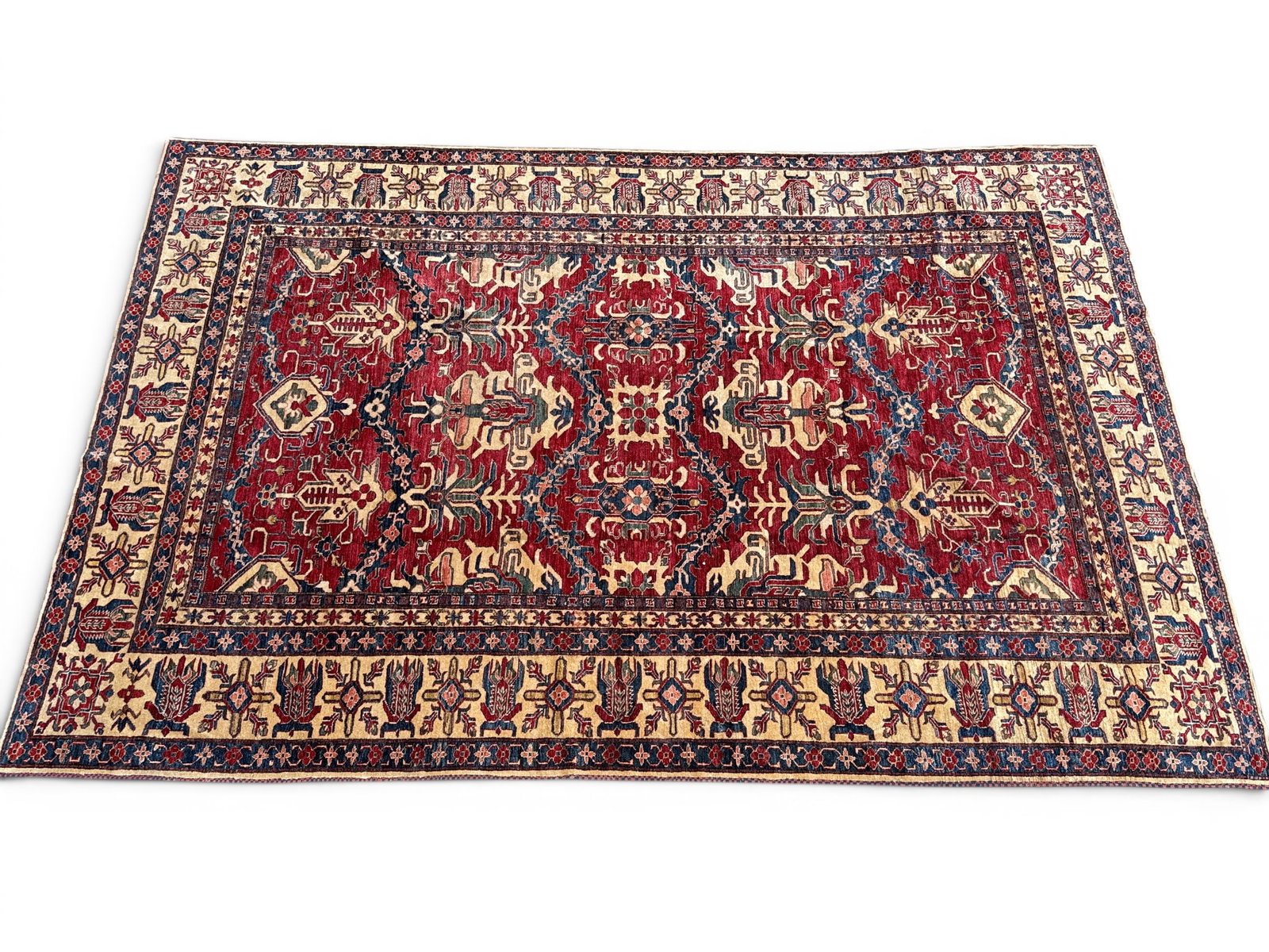 Pakistani Room-Size Carpet, 13ft x 8ft 6in: A Pakistani room-size carpet with a geometric design. 13ft x 8ft 6in. | You have additional shipping options, and are not required to use Live Shipping. Additional shipping and delivery details are av