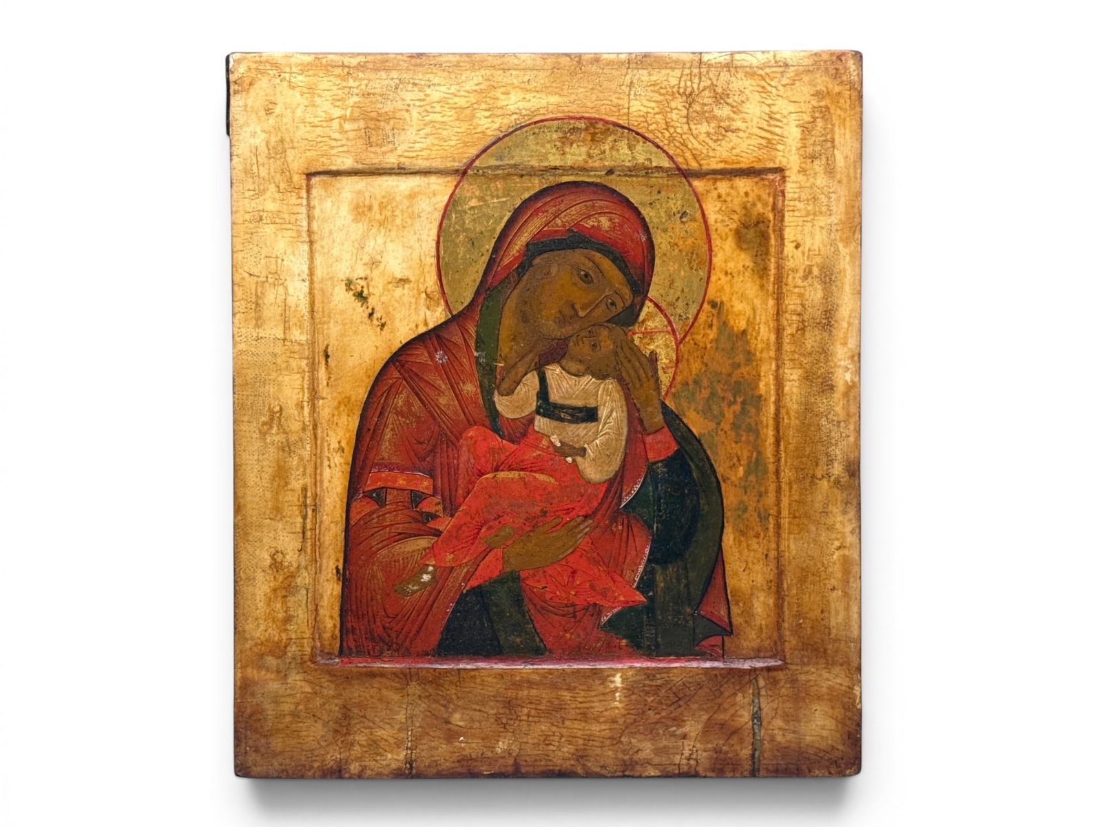 Russian Painted Wood Icon: Mother of God of Tenderness: A Russian painted wood panel icon depicting the Mother of God of Tenderness. 13-1/2in x 11in. | You have additional shipping options, and are not required to use Live Shipping. Additional shipping and