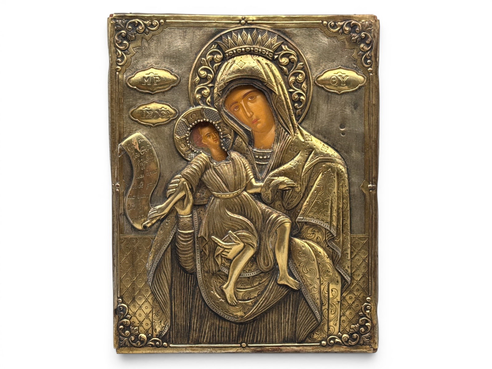 Religious Orthodox Icon: Madonna and Child: A religious Orthodox icon depicting Madonna and Child with a silver tone oklad. 13-1/2in x 10in. | You have additional shipping options, and are not required to use Live Shipping. Additional shipping 