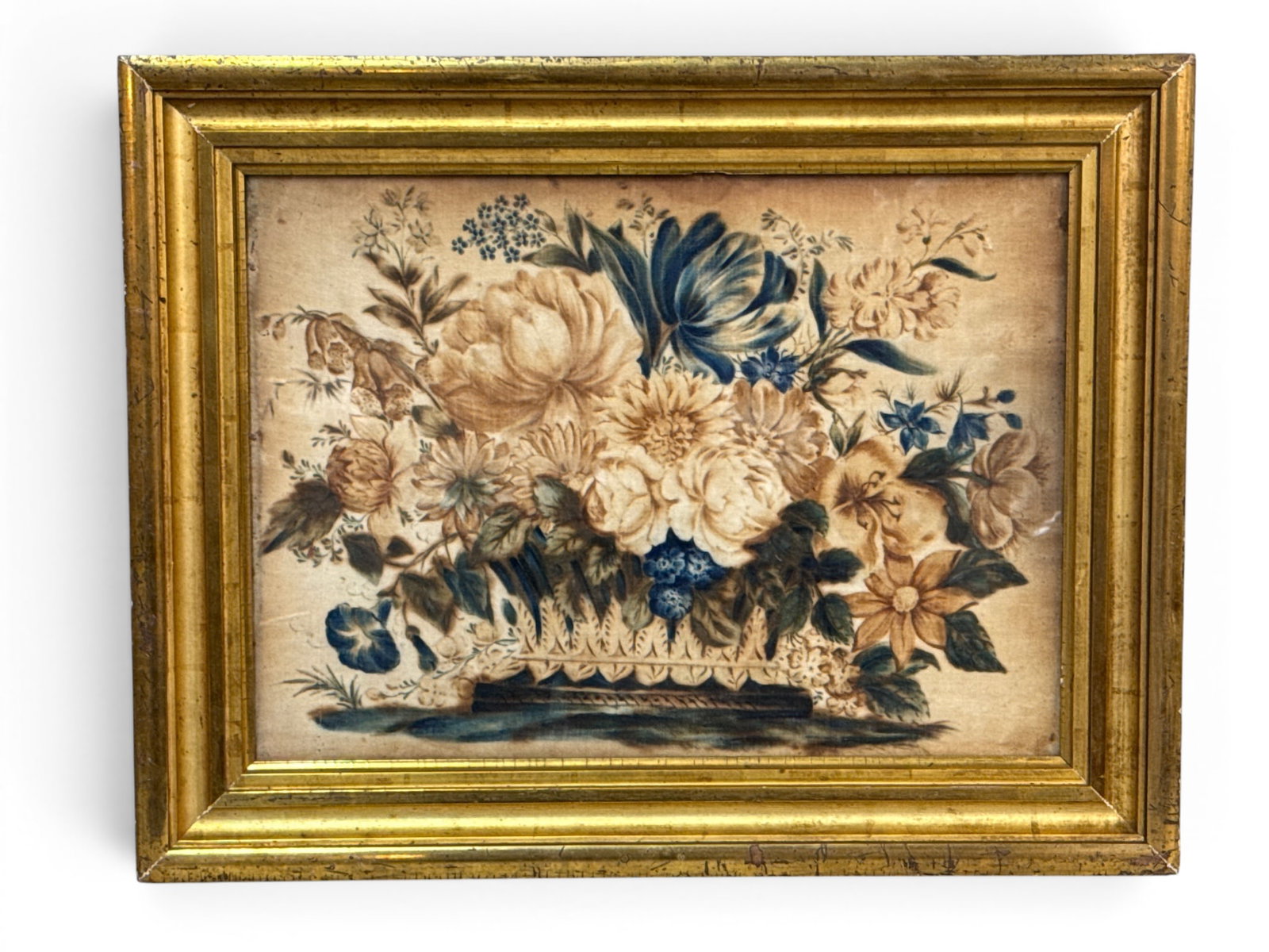 19th C. Theorem Painting on Velvet: Still Life: A 19th C. theorem painting on velvet depicting a floral still life. Gilt framed under glass. Frame opening: 12in x 17in. | You have additional shipping options, and are not required to use Live Shippi