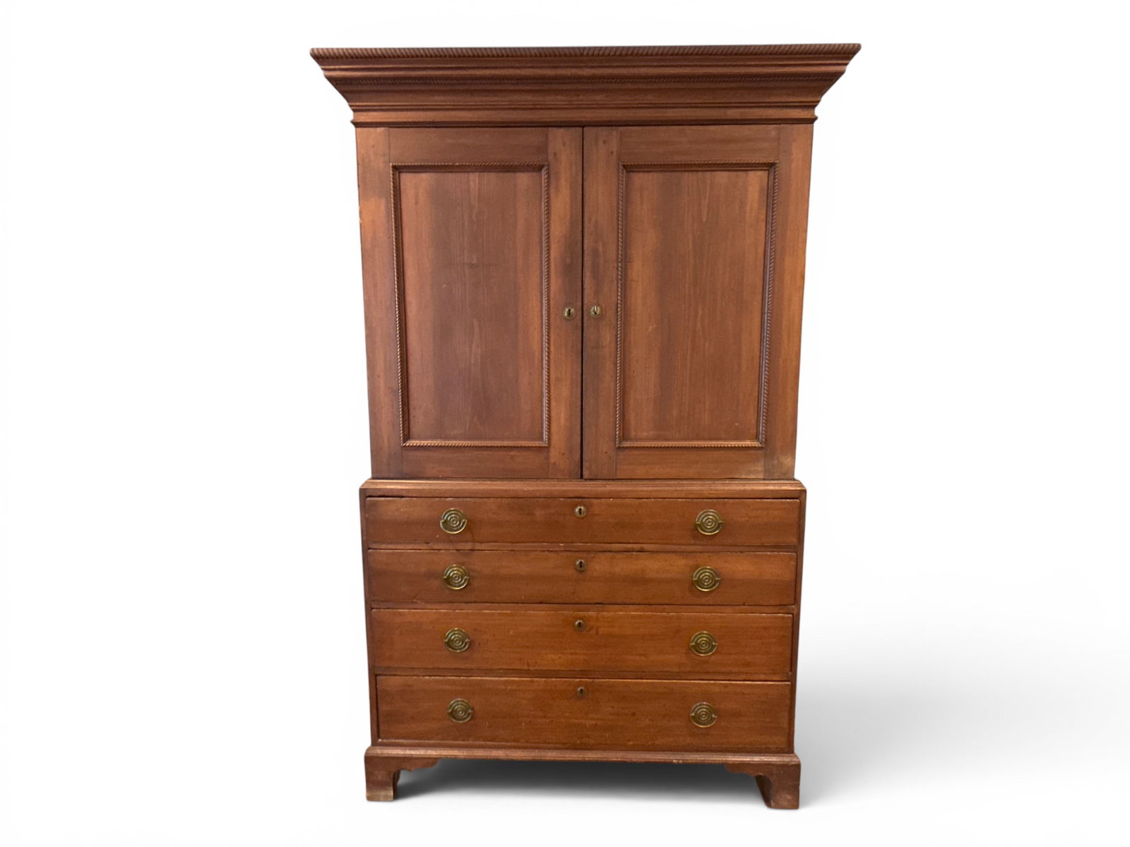 Chippendale Linen Press: An 18th C. Chippendale linen press with a two-door upper case and shelved interior over four graduated drawers on bracket feet. In two parts. 80in tall x 50in wide x 21-1/2in deep. | You have addition