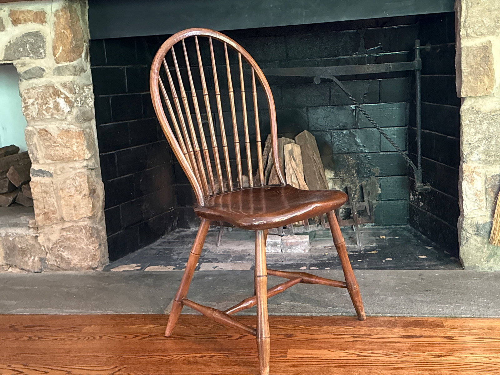 Bamboo-Turned Windsor Side Chair: A 19th C. bamboo-turned Windsor side chair with a shaped plank seat. 38in tall x 20in wide x 16in deep. | You have additional shipping options, and are not required to use Live Shipping. Additional
