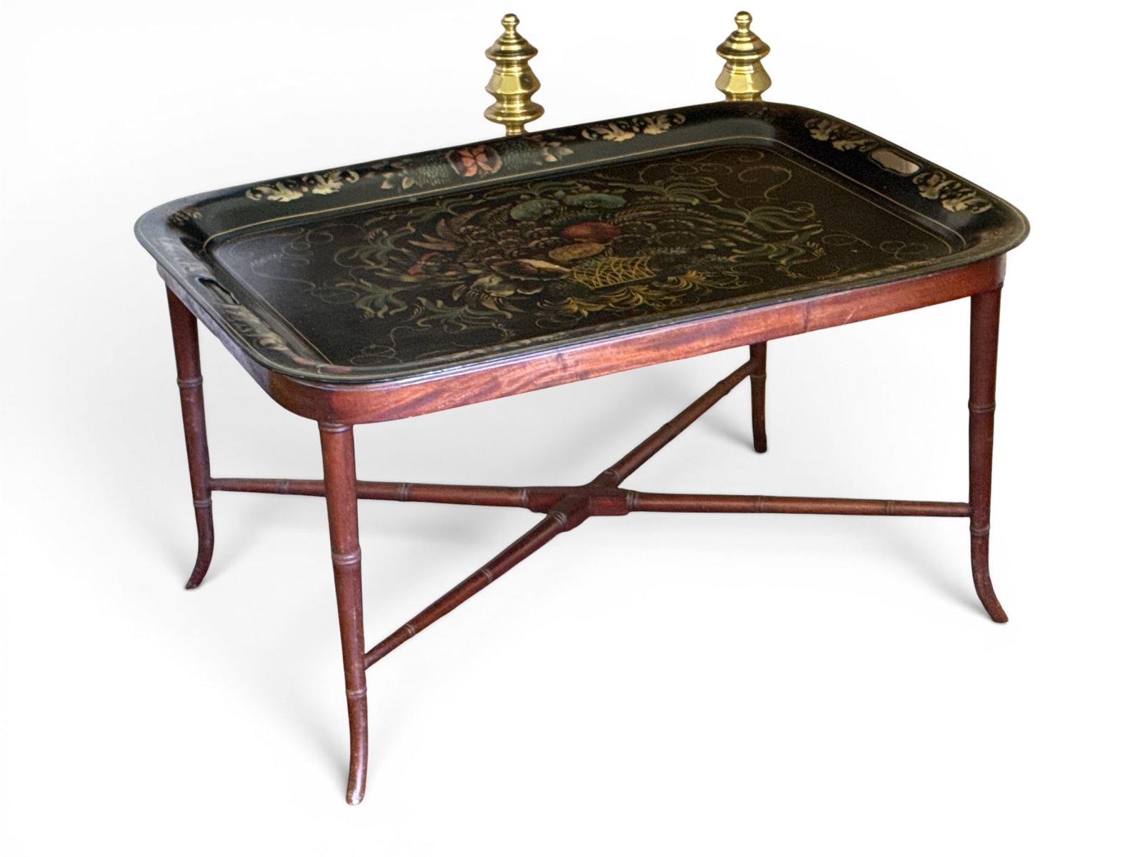 Toleware Tray on Faux Bamboo Stand: A toleware tray having a still life design over a faux bamboo stretcher base table frame. With an additional tray. 16-3/4in tall x 30-1/2in wide x 22 in deep. | You have additional shipping options,
