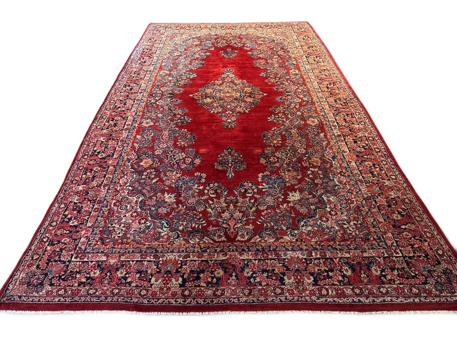 Persian Sarouk Room Size Carpet: A Persian Sarouk room size carpet having a shaped foliate medallion and red background. 11ft x 18ft. | You have additional shipping options, and are not required to use Live Shipping. Additional shipp