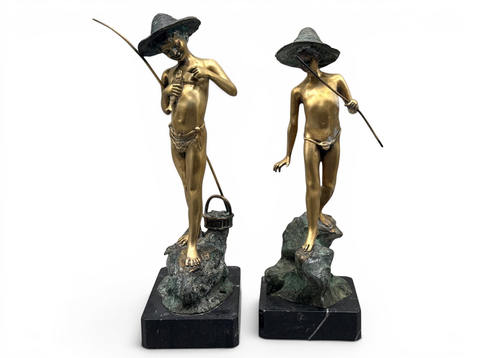Two After Giovanni Varlese Bronzes: Fisherman: After Giovanni Varlese (Italian, 1882-1922). "Pescatorello": two patinated bronze sculptures of young fishermen. Larger: 17in tall x 8in wide. | You have additional shipping options, and are not requi