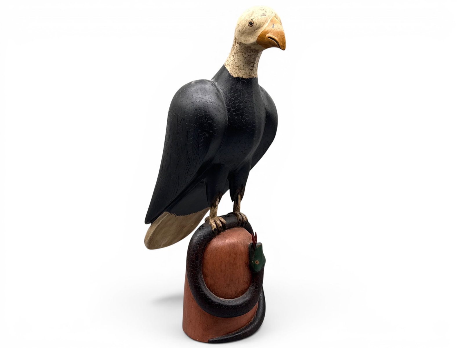 Folk Art Carved and Painted Figure of an Eagle and Snake: A Folk Art carved and painted figure of a perched eagle and snake. 23-1/2in tall x 11in wide. | You have additional shipping options, and are not required to use Live Shipping. Additional shipping and