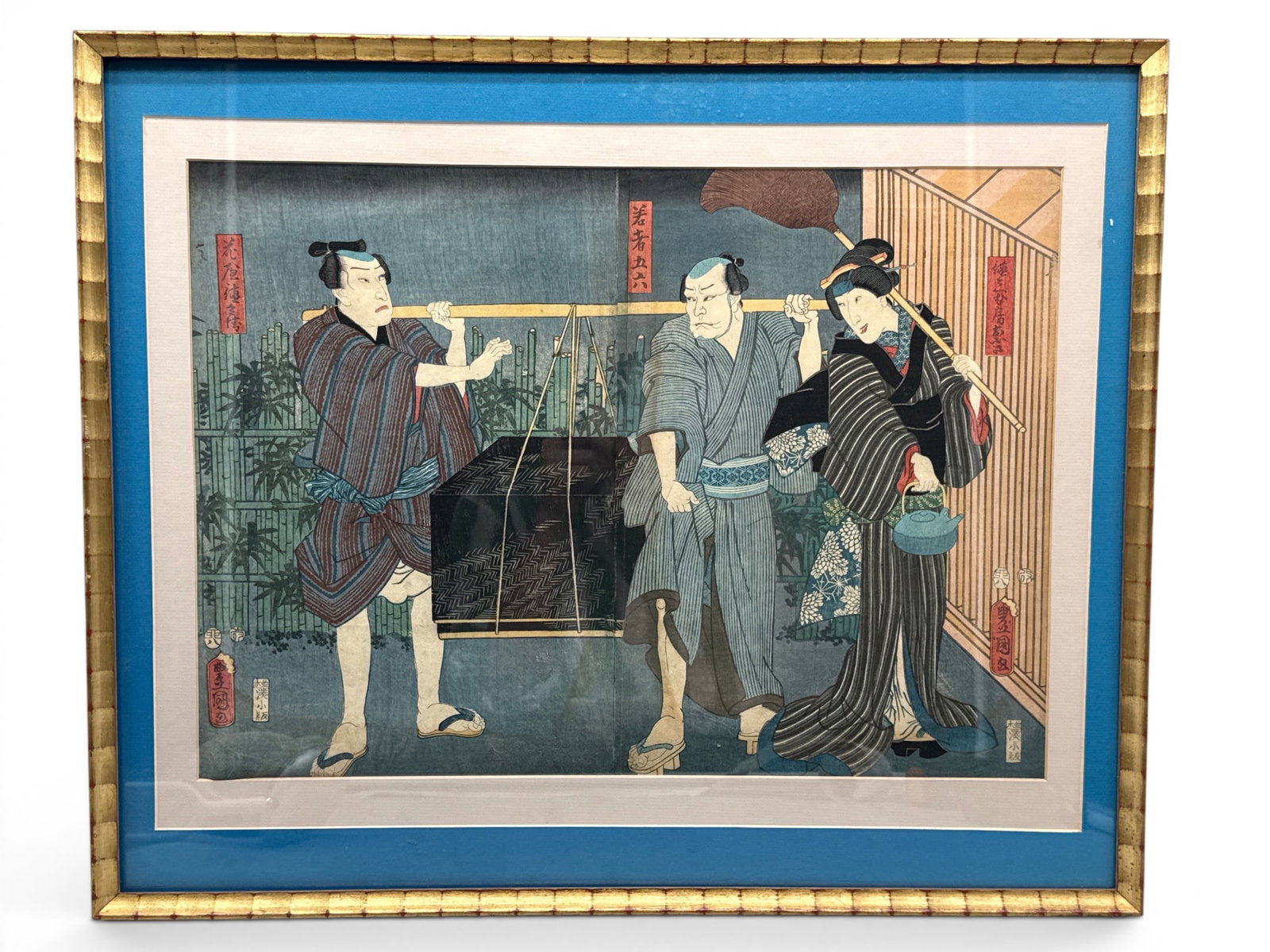 Utagawa Kunisada. Woodblock: Kabuki Actors: Utigawa Kunisada (Japanese, 1786-1865) A woodblock print depicting Kabuki actors carrying water. Frame: 19in tall x 23in wide. Mat opening: 13in tall x 18-1/2in wide. | You have additional shipping