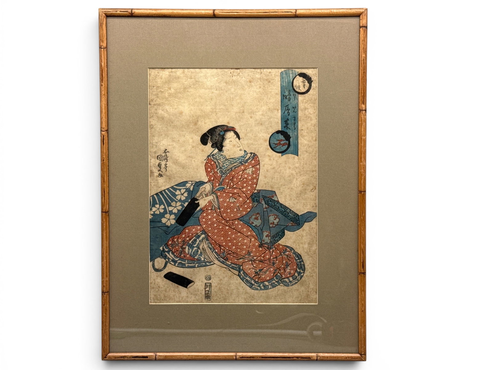 Utagawa Kunisada. Woodblock: Interior Scene: Utagawa Kunisada (Japanese, 1786-1865) A woodblock print depicting interior genre scene. Frame: 20-1/2in tall x 15-1/2in wide. Mat opening: 13-1/2in tall x 10in wide. | You have additional shipping