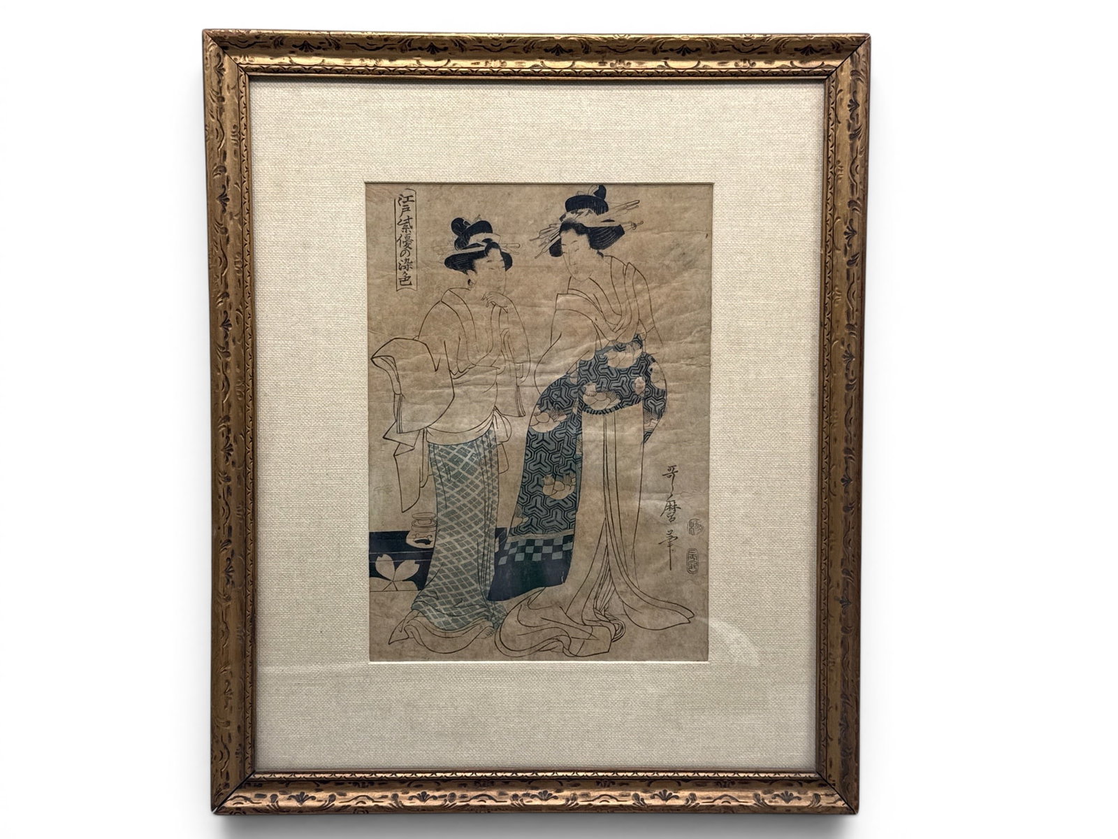 Kitagawa Utamaro. Woodblock: Two Courtesans: Kitagawa Utamaro (Japanese, died 1806) A woodblock print having two courtesans wearing ceremonial kimonos. 19in tall x 15-1/2in wide. Mat opening: 11-1/2in tall x 8-1/2in wide. | You have additional