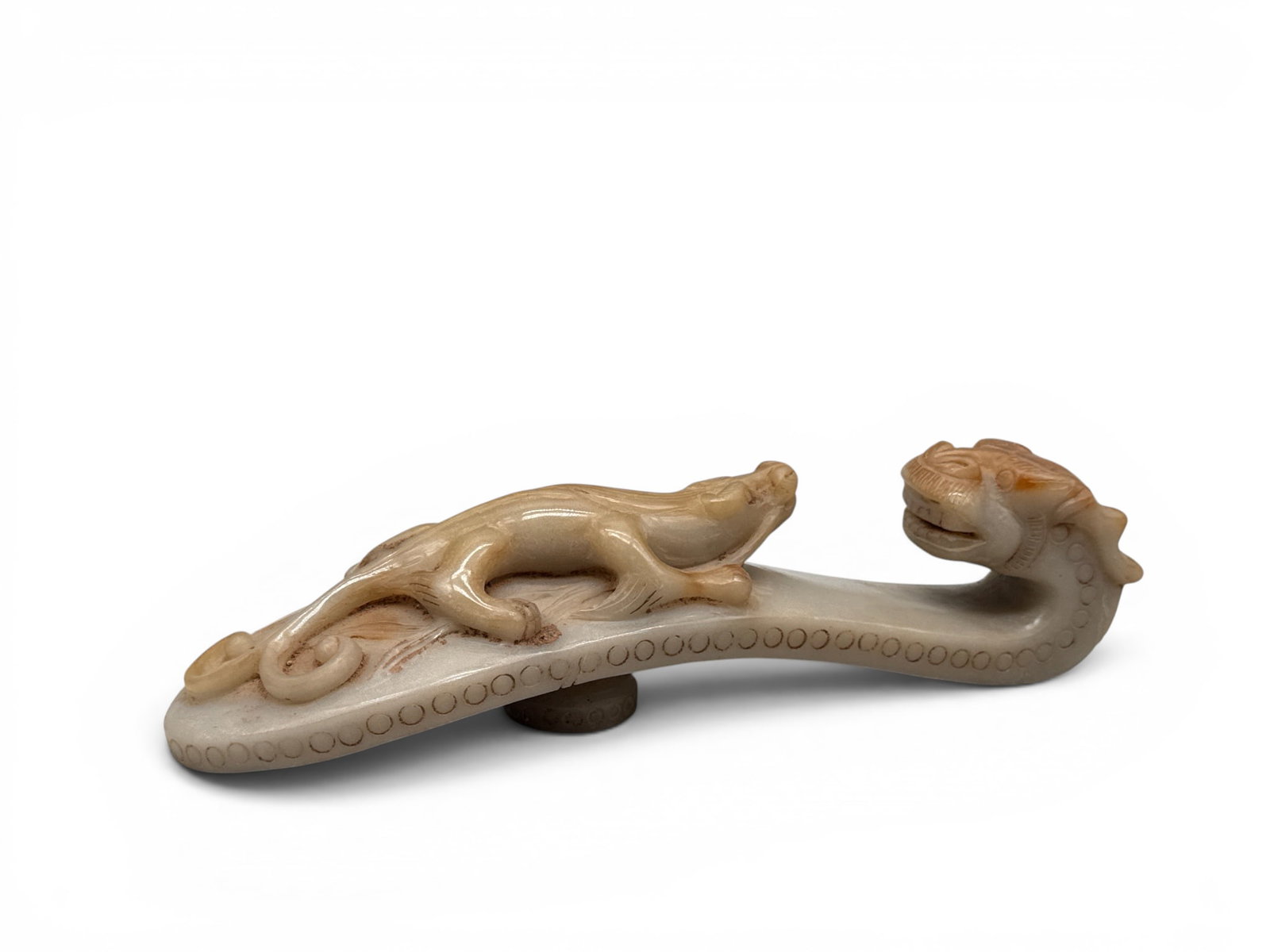 Chinese Hetian Jade Belt Hook: A Chinese carved Hetian jade belt hook having dragon and lizard form. 4in tall x 11in wide. | You have additional shipping options, and are not required to use Live Shipping. Additional shipping and d