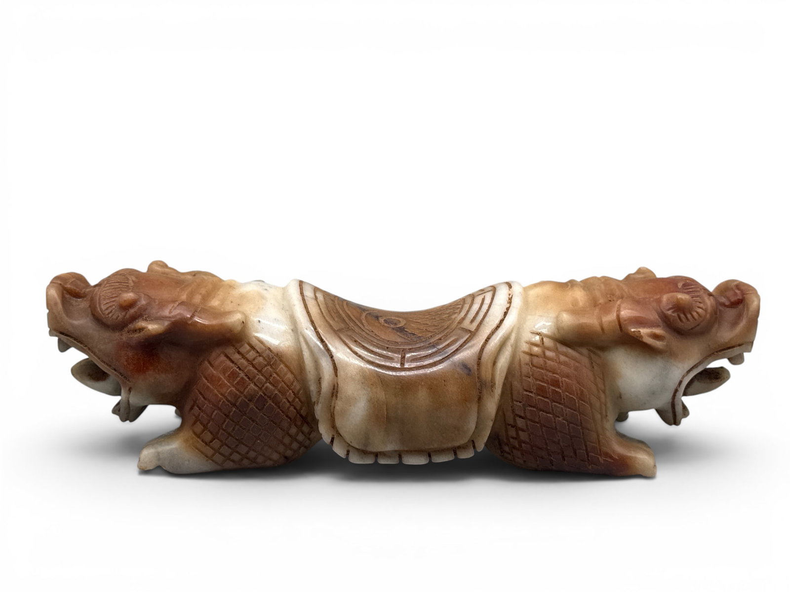Chinese Hetian Jade Mythical Creature: A Chinese Hetian Jade two headed mythical creature having carved detail. 3in tall x 12in wide. | You have additional shipping options, and are not required to use Live Shipping. Additional shipping