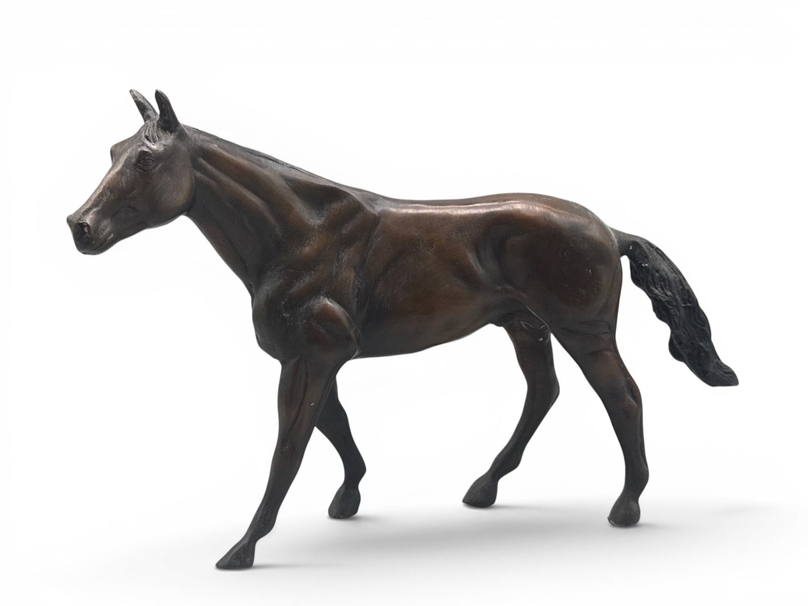 Bronze Race Horse Sculpture: A bronze race horse sculpture. 11in tall x 18in wide. | You have additional shipping options, and are not required to use Live Shipping. Additional shipping and delivery details are available on our w