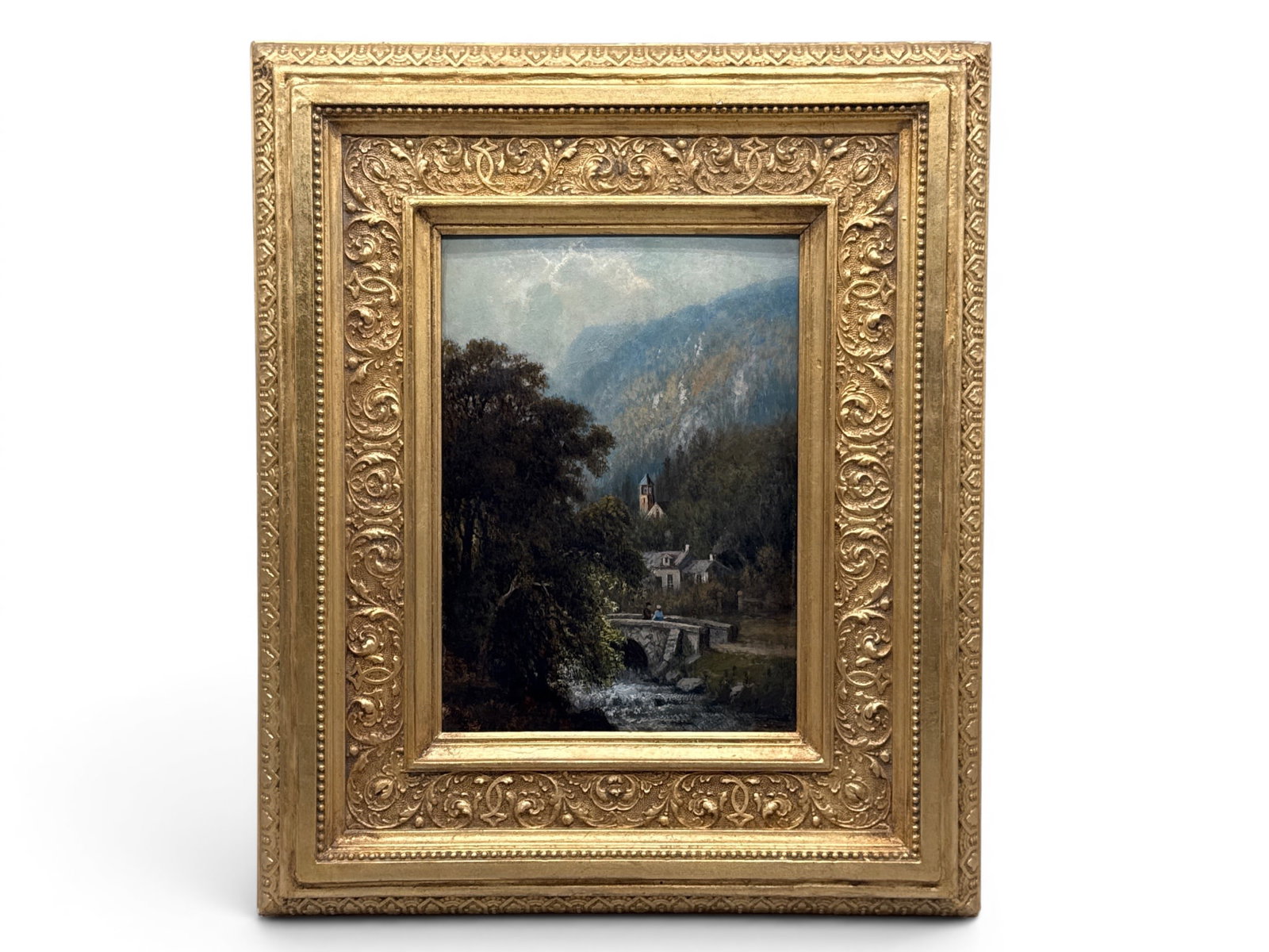 Gilt-Wood Oil/Board: Landscape: A gilt-wood framed, oil on board landscape scene with a courting couple on a bridge. Board: 10-1/2in tall x 7in wide. Frame: 18in tall x 15in wide. | You have additional shipping options, and are not 