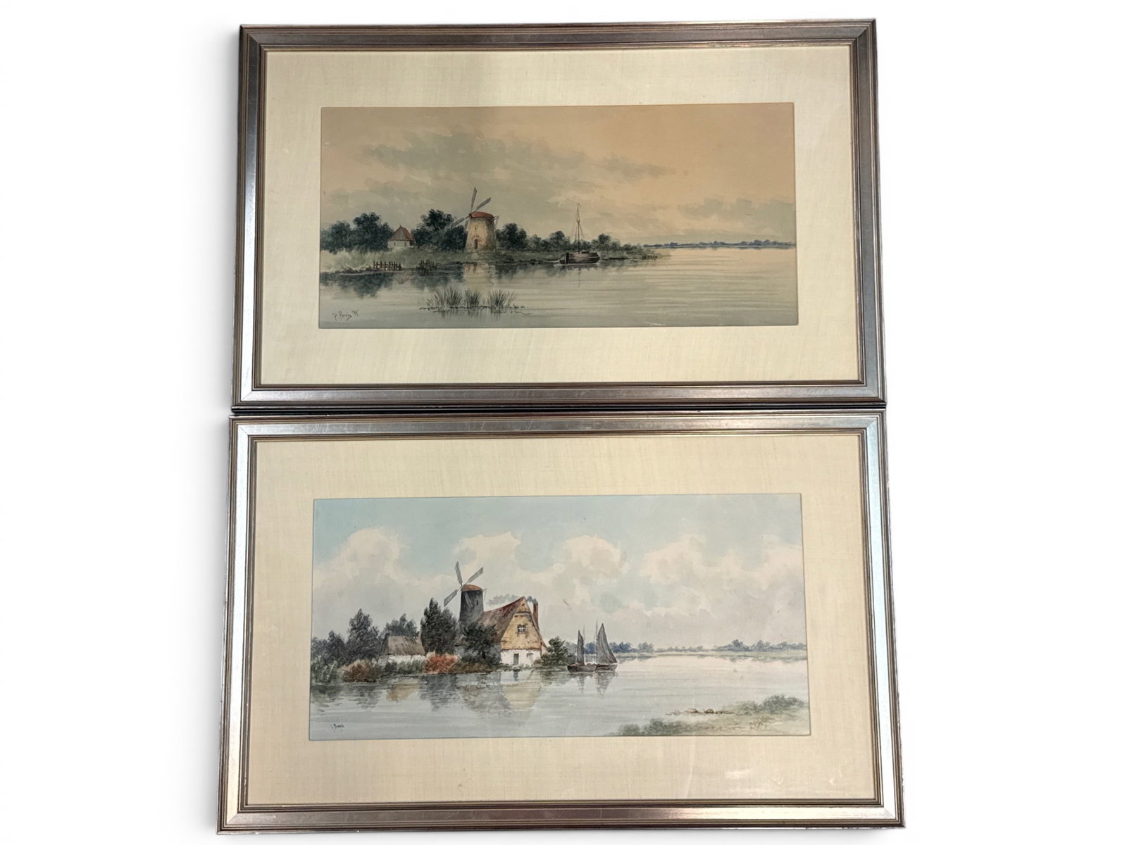 Two Philippe Perrin Watercolors: Windmills: Two Philippe Perrin watercolors on paper landscapes with bucolic windmill scenes. Signed Perrin. Mat openings: 11in tall x 23in wide. Frame: 19in tall x 31-1/2in wide. | You have additional shipping o