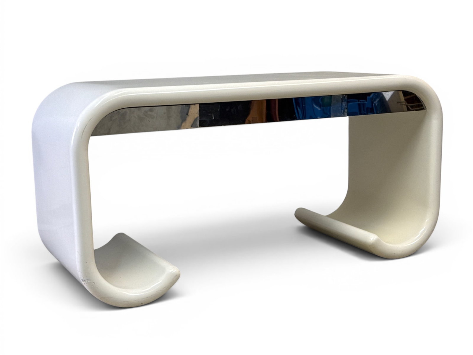 Karl Springer Style Scrolled Vanity Desk: A Karl Springer style white lacquer scrolled vanity desk having chromed metal trim. 29in tall x 56in wide x 23 in deep. Some loose metal trim. | You have additional shipping options, and are not requi