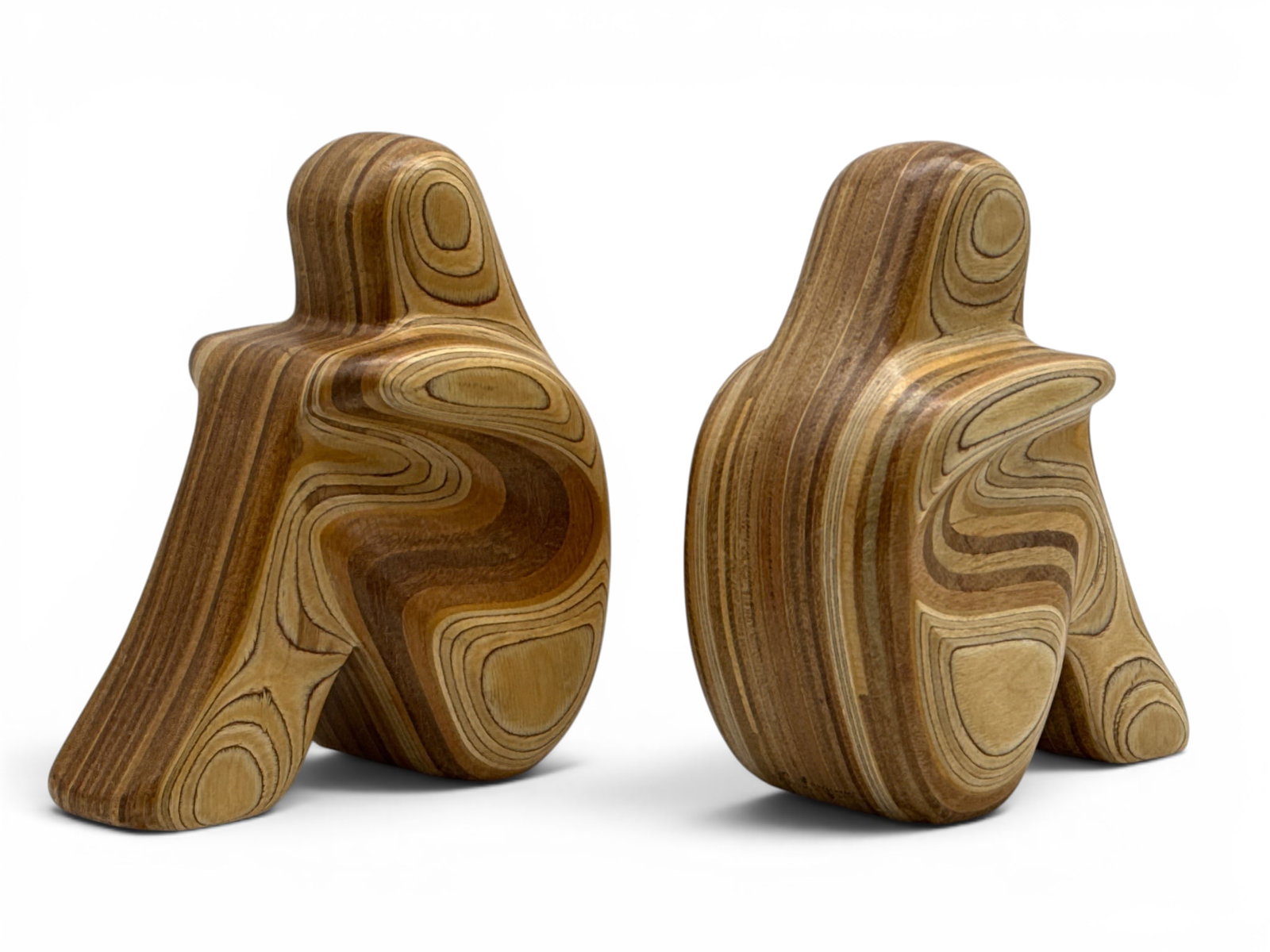 Robert Hargrave Pair of Modernist Figural Bookends: A pair of Robert Hargrave modernist carved laminated plywood figural bookends. Signed. Each: 9in tall x 4-3/4in wide x 8 in deep. | You have additional shipping options, and are not required to use Li